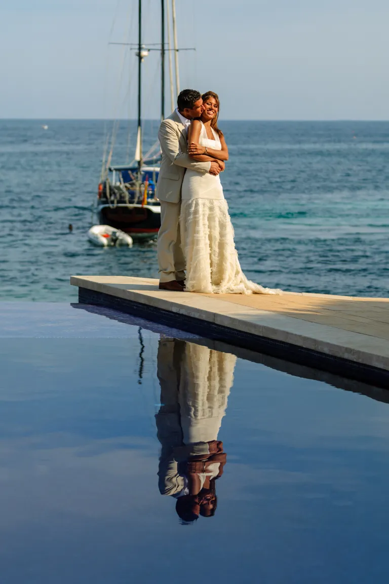 Bride & groom at Hospes Maricel Majorca infinity pool by Andrew Hazard Photography