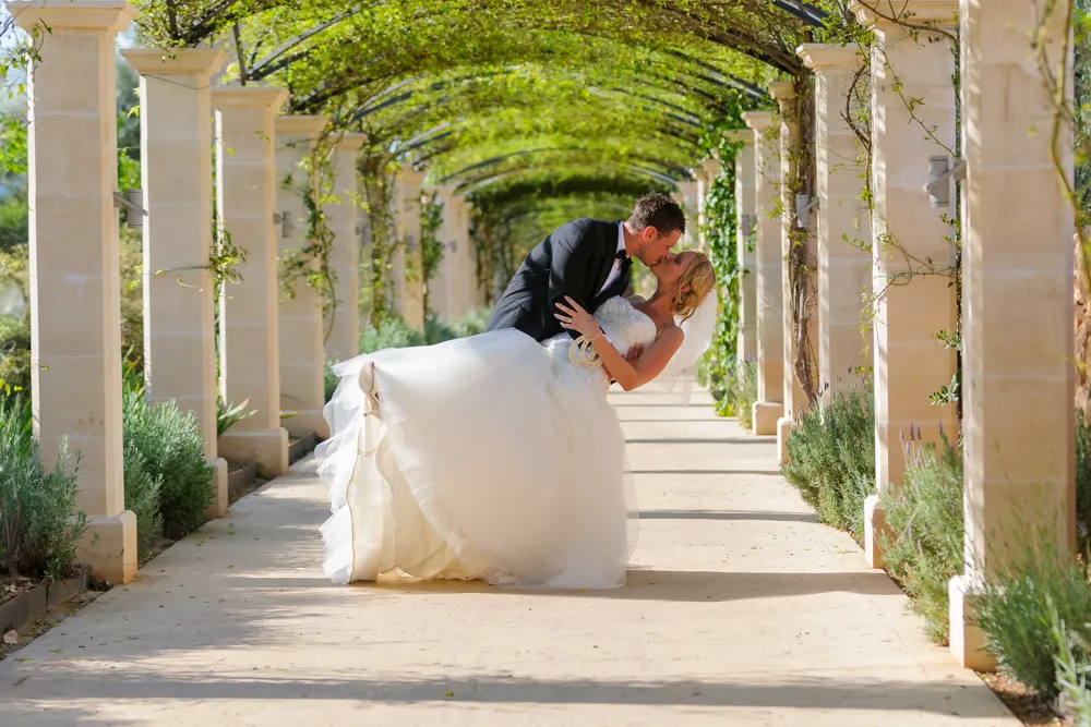 bride and groom kissing at Zoetry Majorca