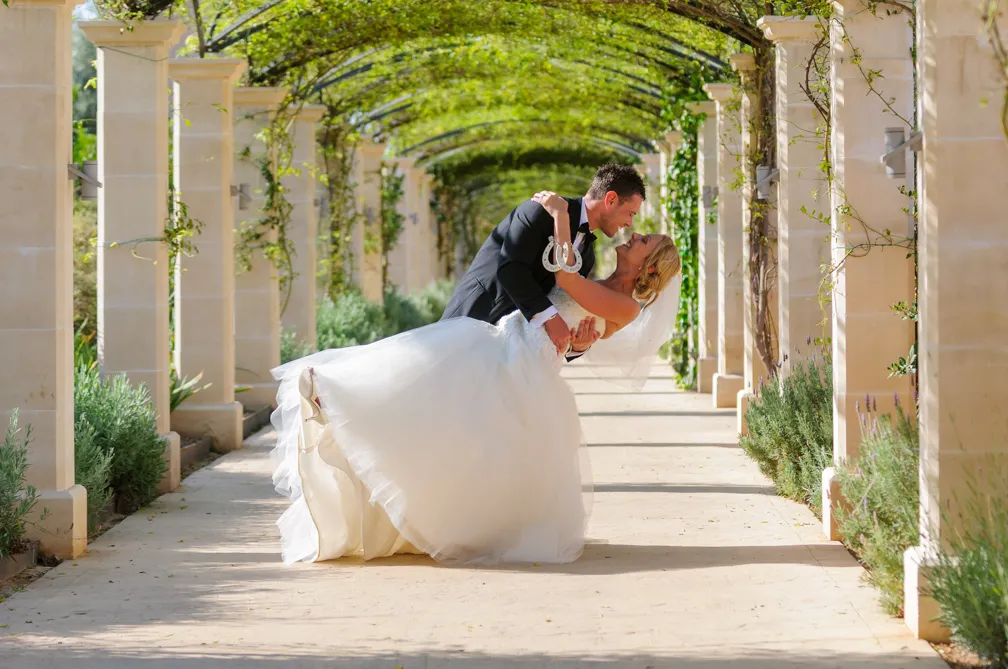 bride and groom kissing at Zoetry Majorca