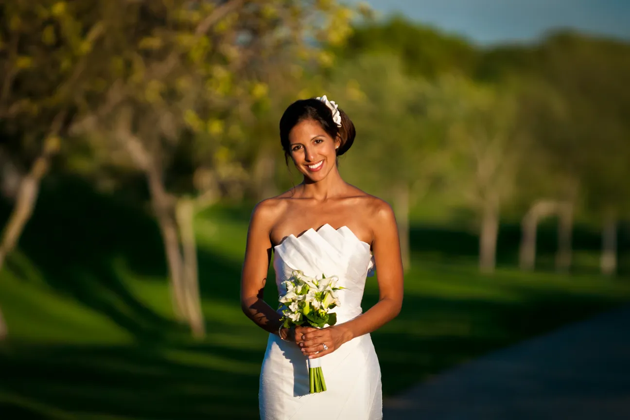 Bride in golden hour at vall dor golf club
