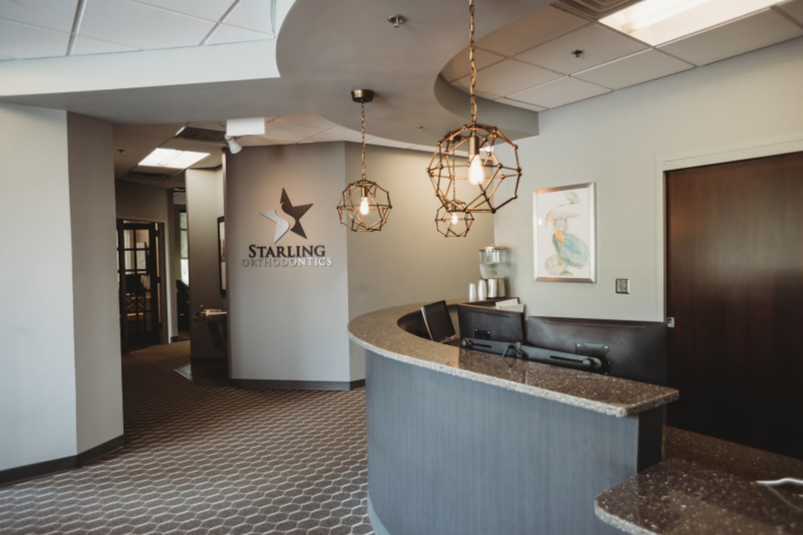 Modern Starling Orthodontics reception desk and waiting area with contemporary design