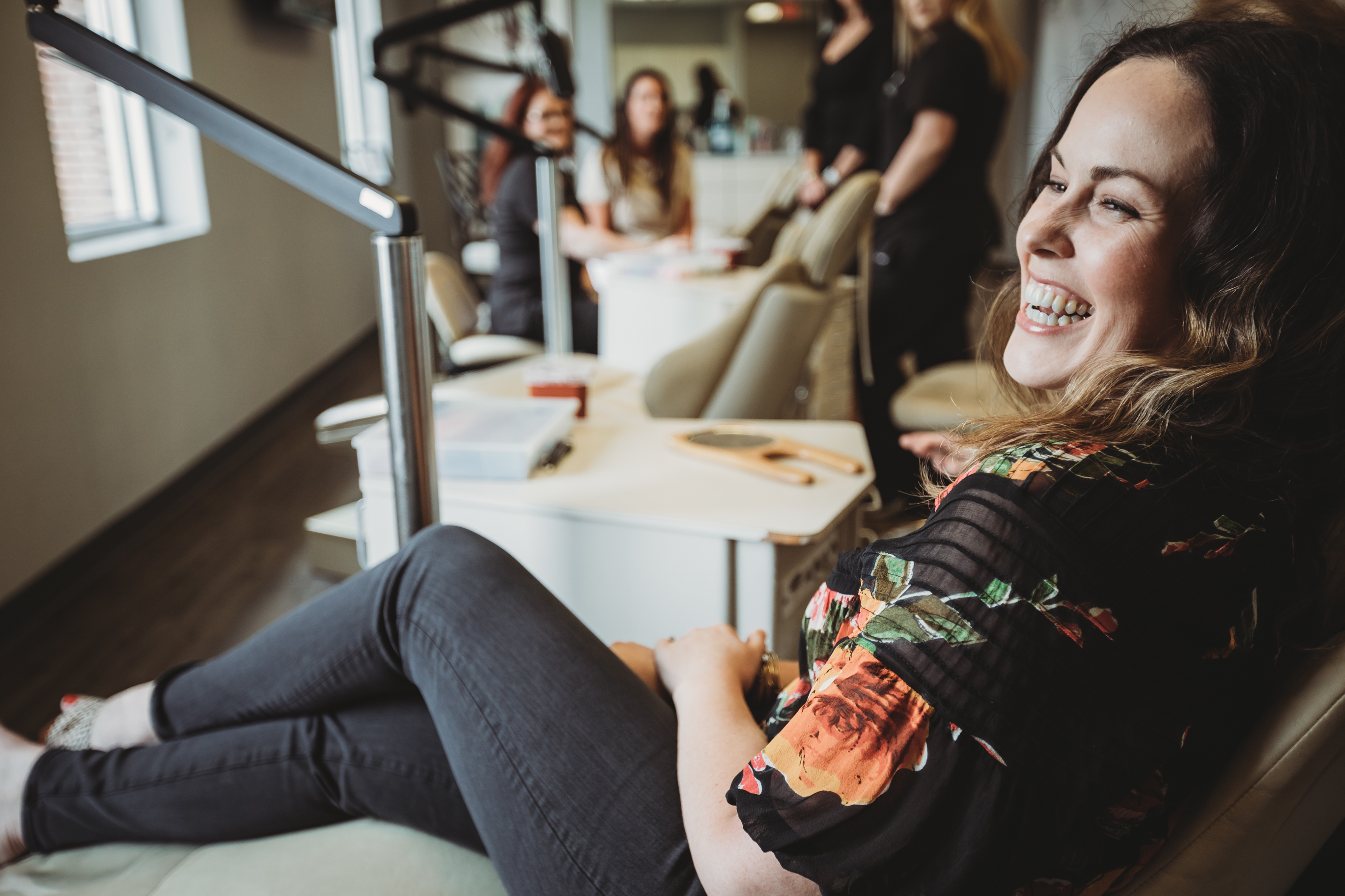 An adult orthodontic patient wearing lingual braces at Starling Orthodontics