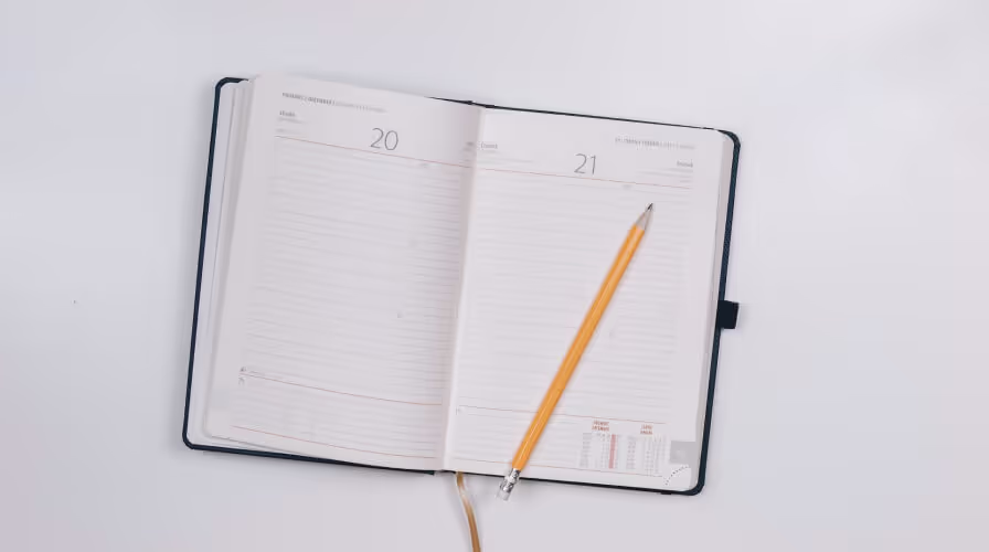 Personal calender and a pencil