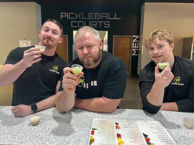 Group of employees at Midtown Atlantic Club with PFC Juice Bar