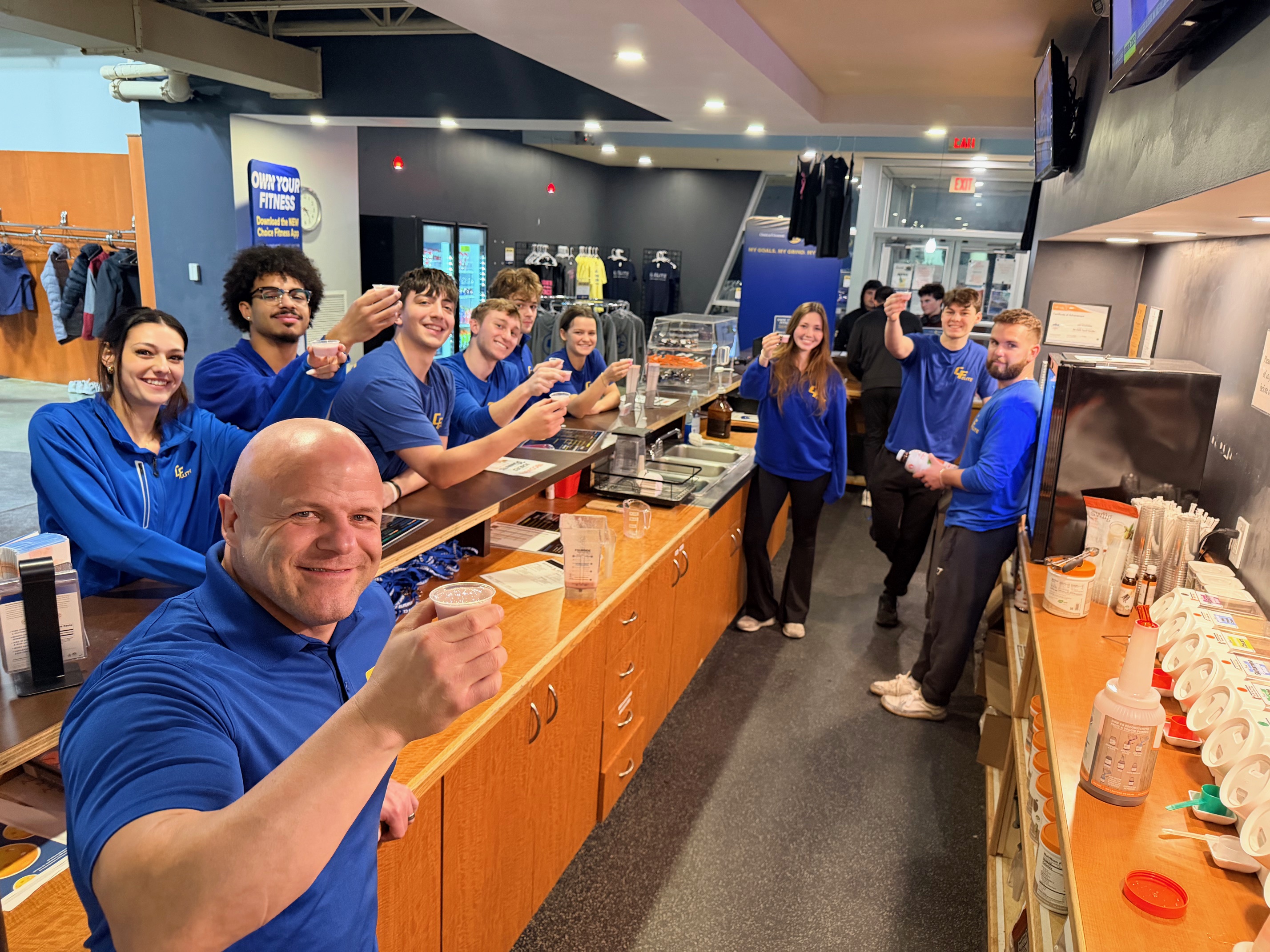Group of employees at Midtown Atlantic Club with PFC Juice Bar
