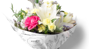 Bouquet of flowers wrapped in custom printed floral tissue paper