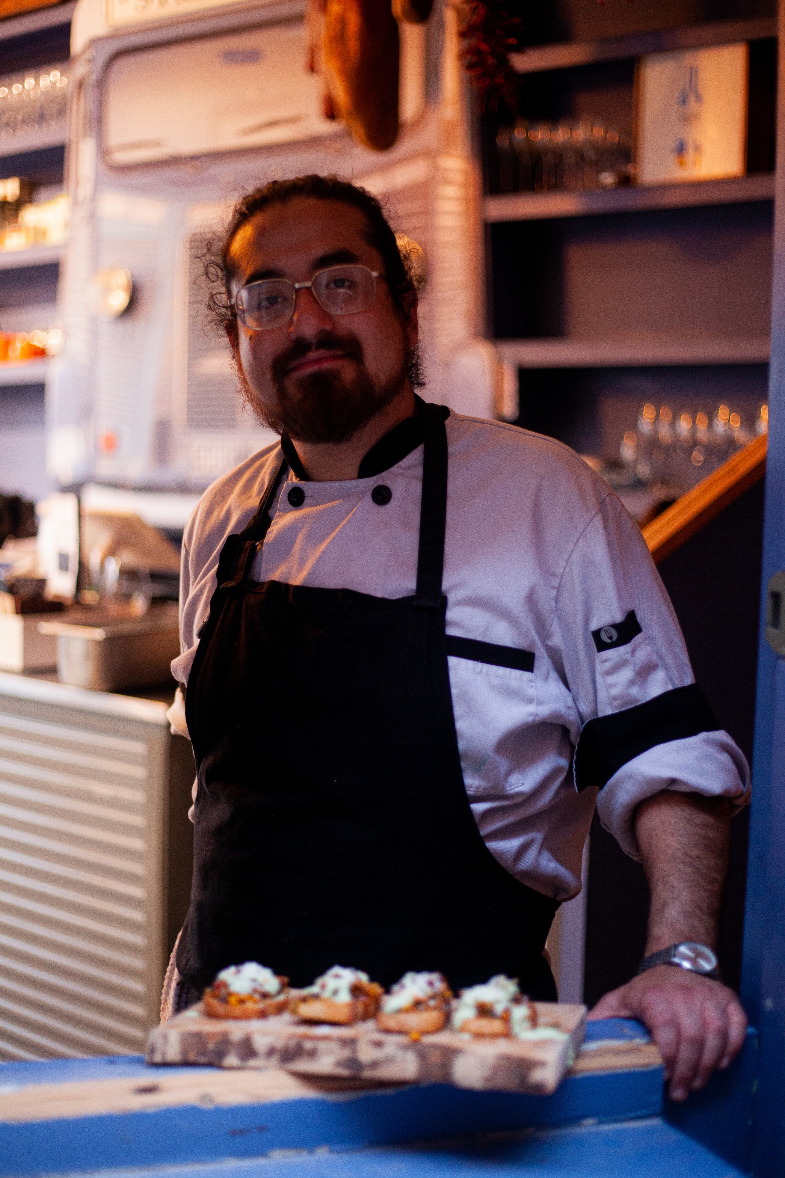 Chef looking out his restaurant door in Dublin