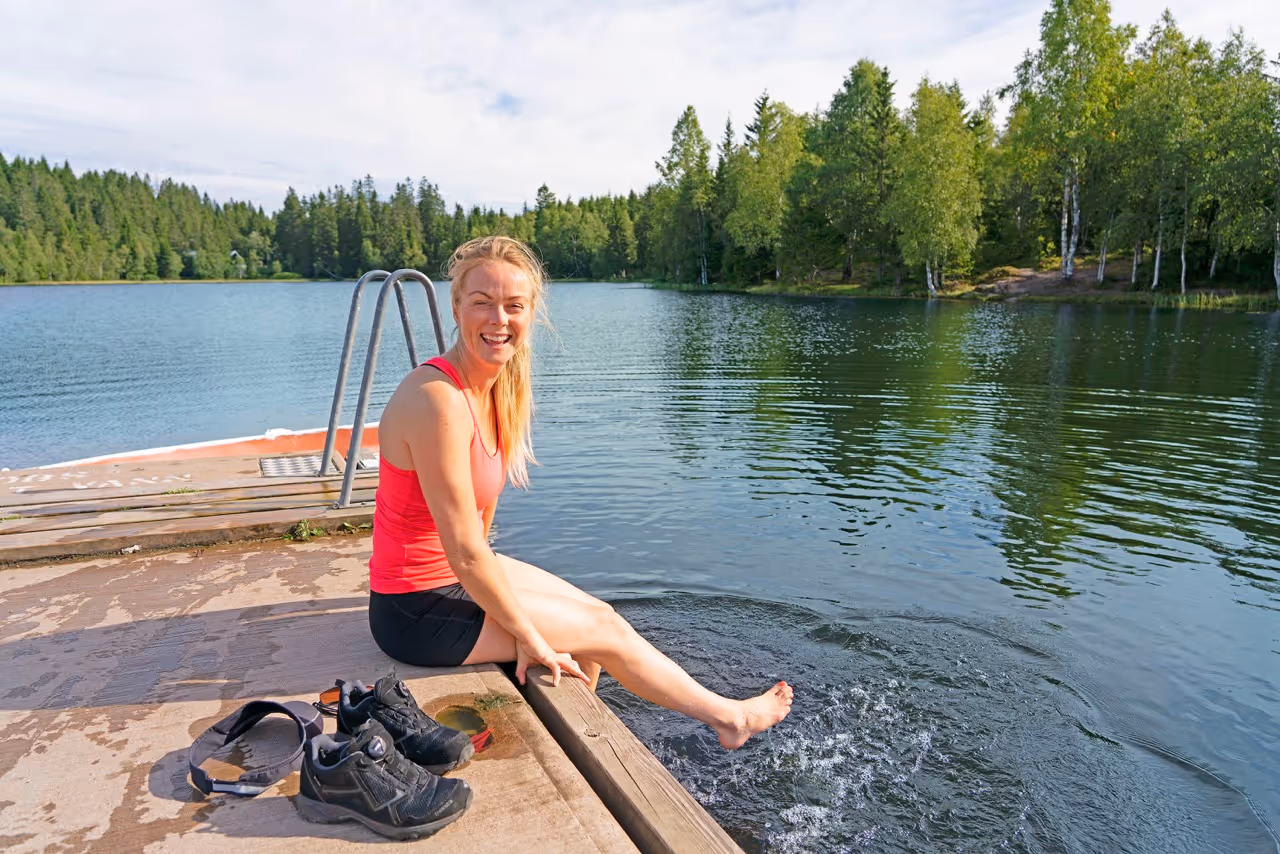 Swimming in the forest lake near Oslo
