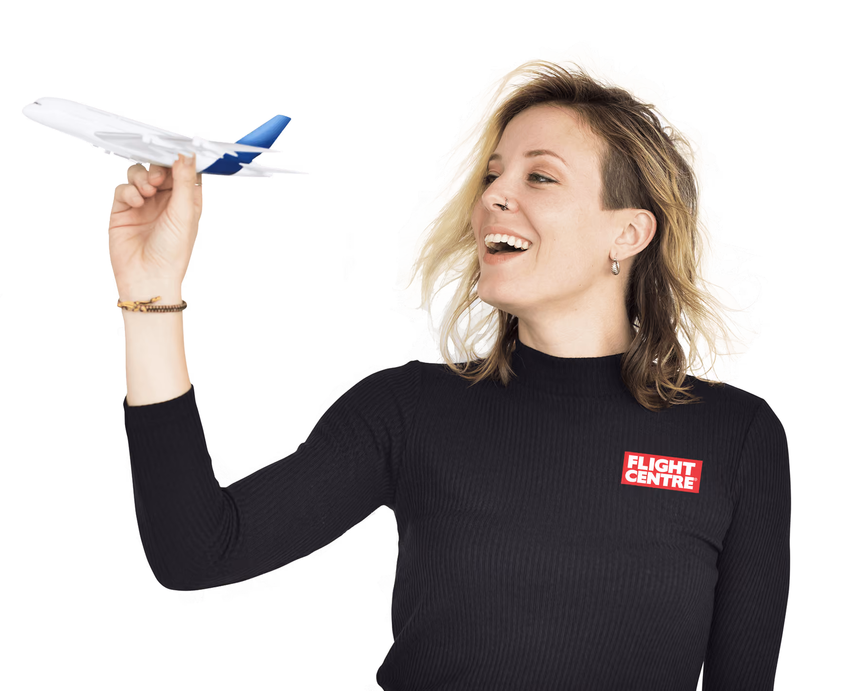 universal traveller team member holding a toy aeroplane