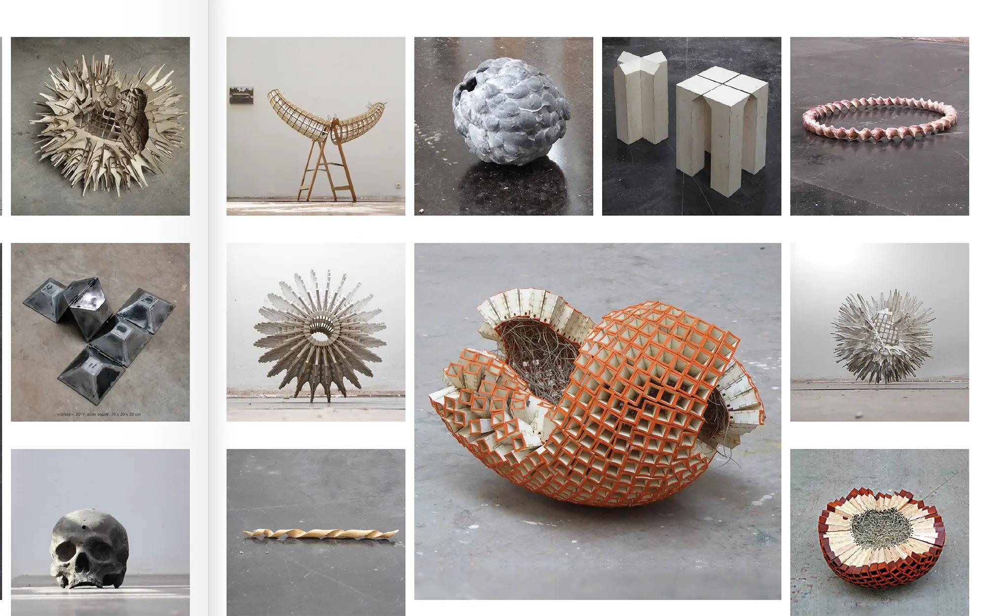 Portfolio Archive from graphic designer Laura Jouan, 2015-present. "Gallery display of various abstract sculptures, including spiked circular forms, geometric shapes, a skull replica, and lattice structures in a studio setting."