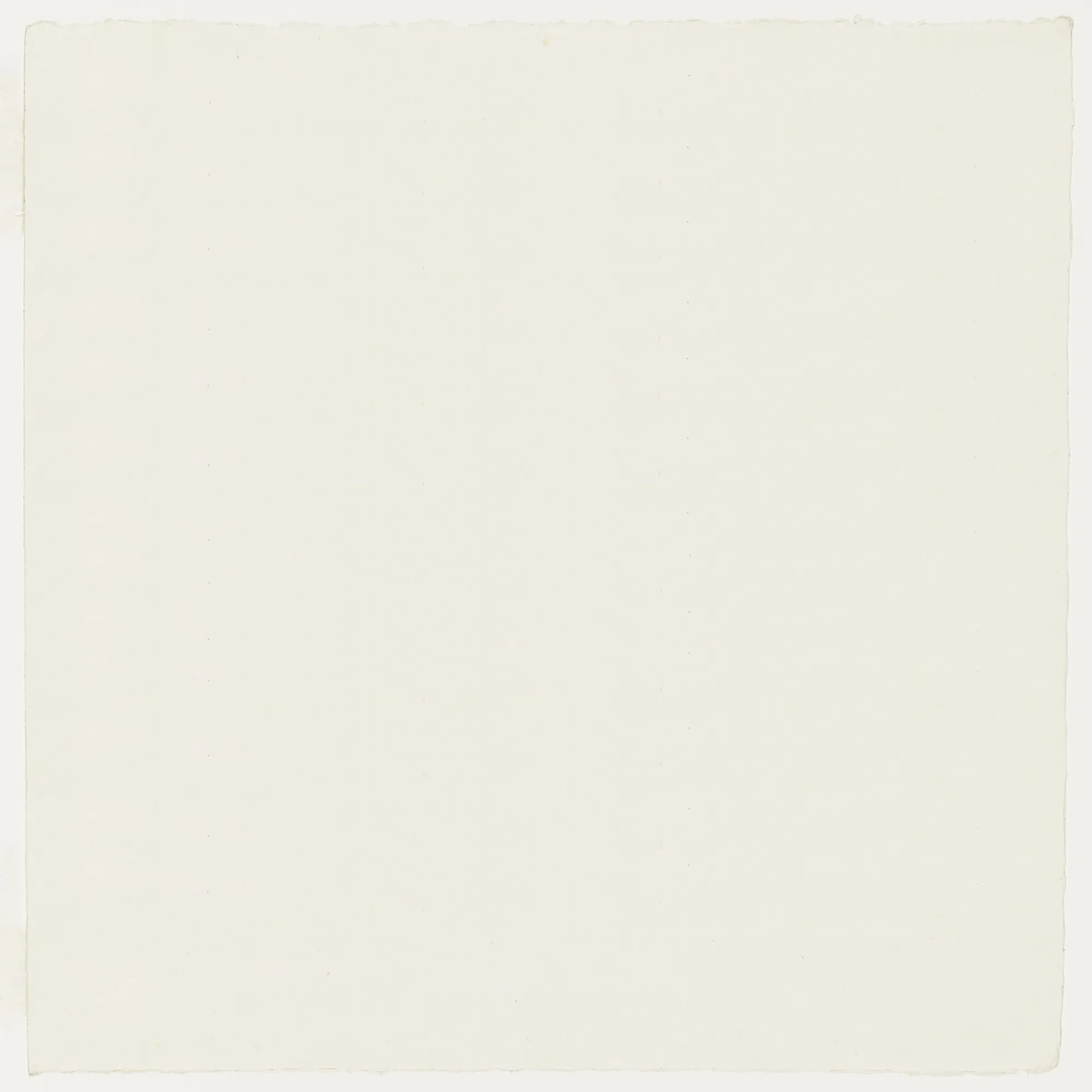Blank off-white paper with slightly rough edges.
