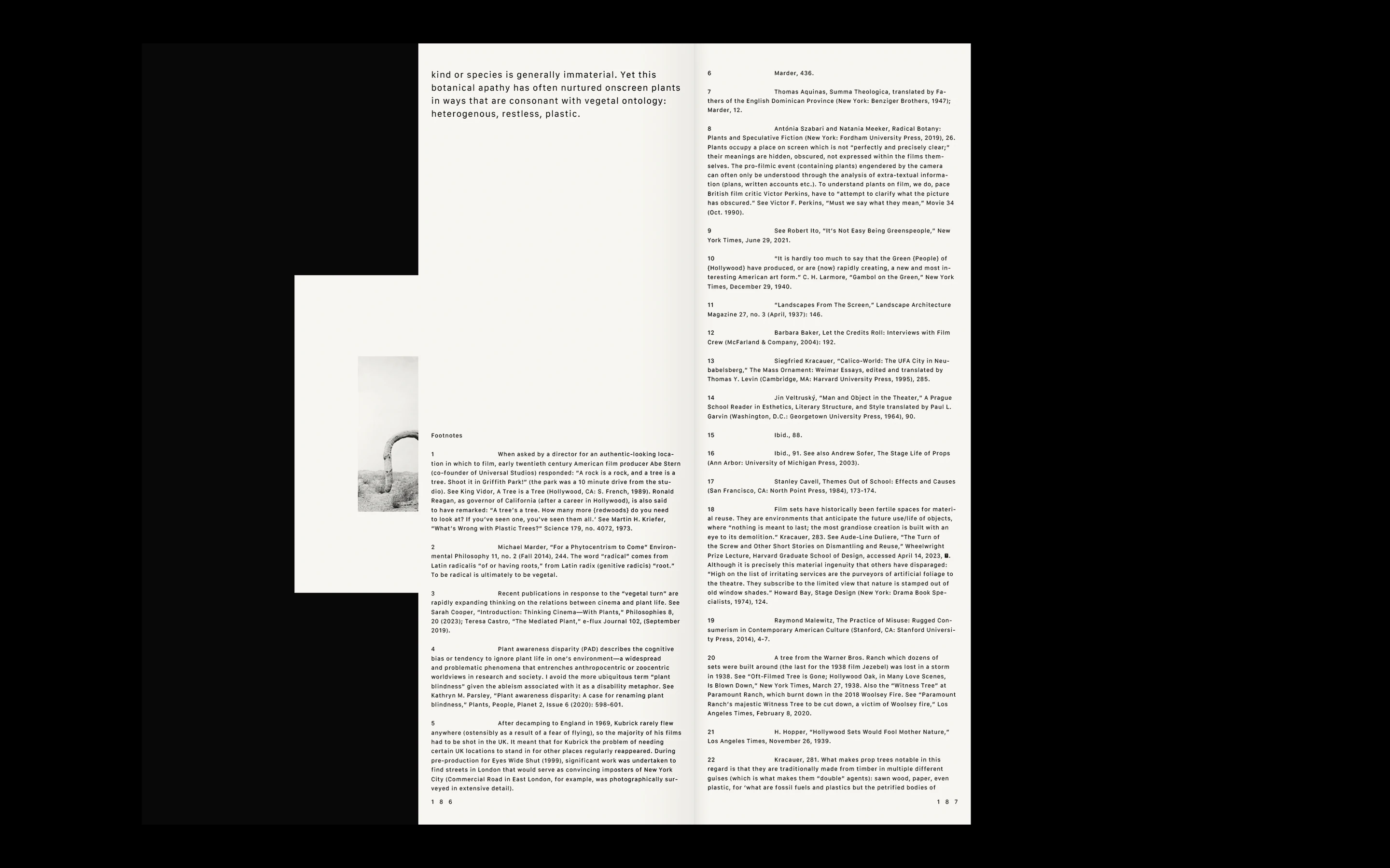 Two-page spread of a book showing text with footnotes and a small black-and-white photo of a stone arch in a barren landscape.
Branding & Website Development — Visual identity, art direction, editorial, portfolio, social and website (design & programming) for the architecture & design studio, 1009, based in London. www.10-09.com
— designed by Laura Jouan, 2024