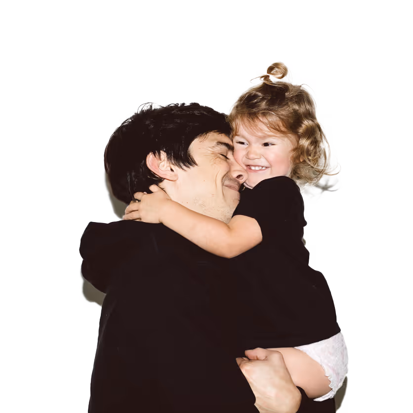 dad embracing his child
