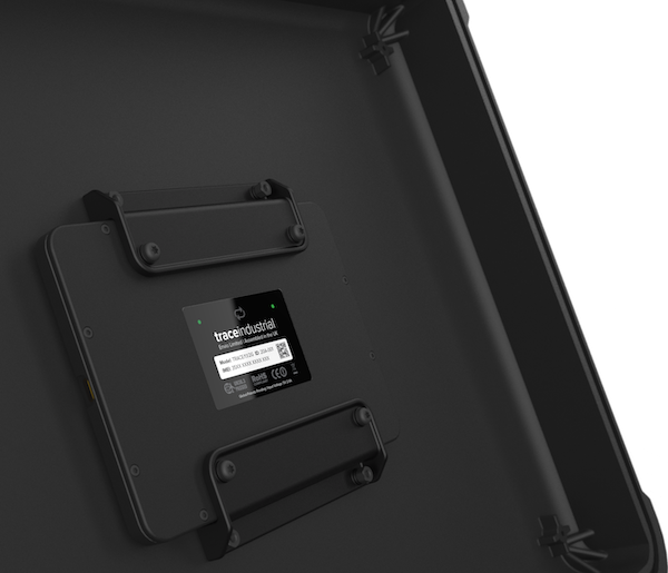 Close-up of a black device mounted inside a case with a label showing traceindustrial branding and model info.