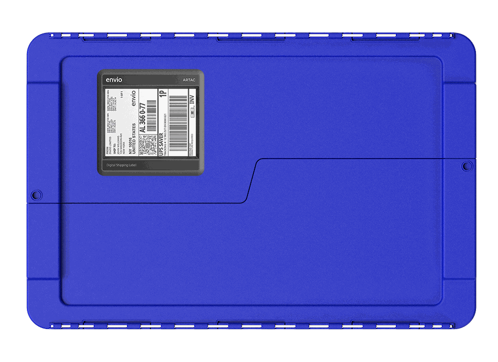 Blue plastic container lid with worn shipping labels and scratches.