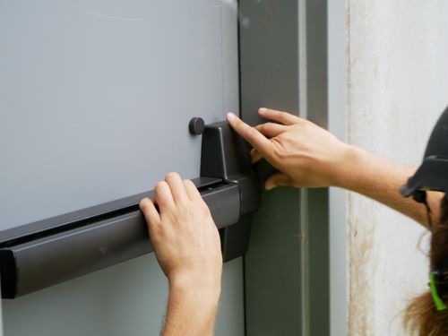 Jay and Chad Himmel in front of the Prairieville Himmel building