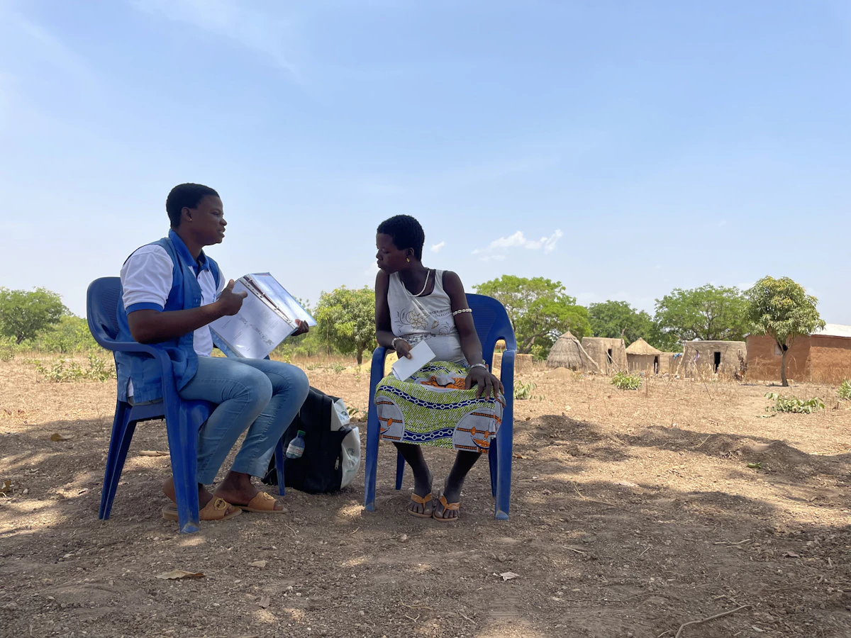 A pregnant mom receiving prenatal care from a Community Health Worker in Togo.