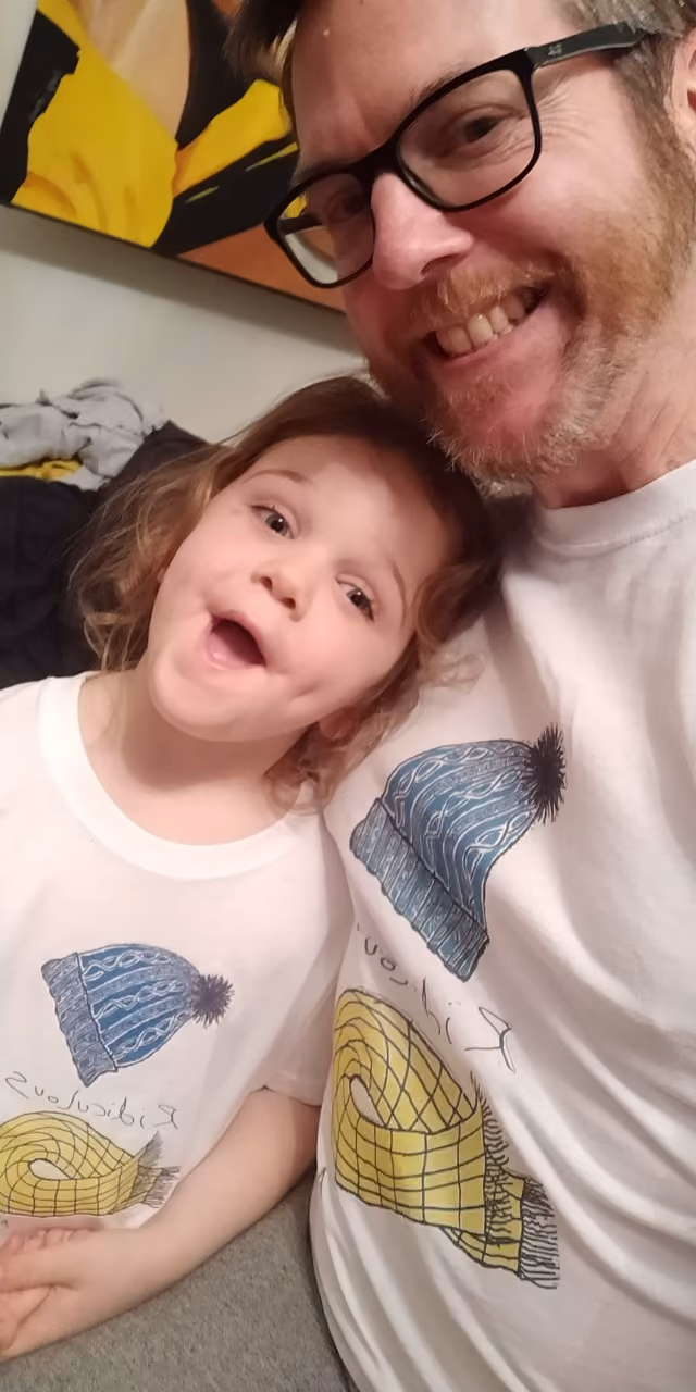 Neil Newnham and daugher Reya wearing their Para Monte T-Shirts