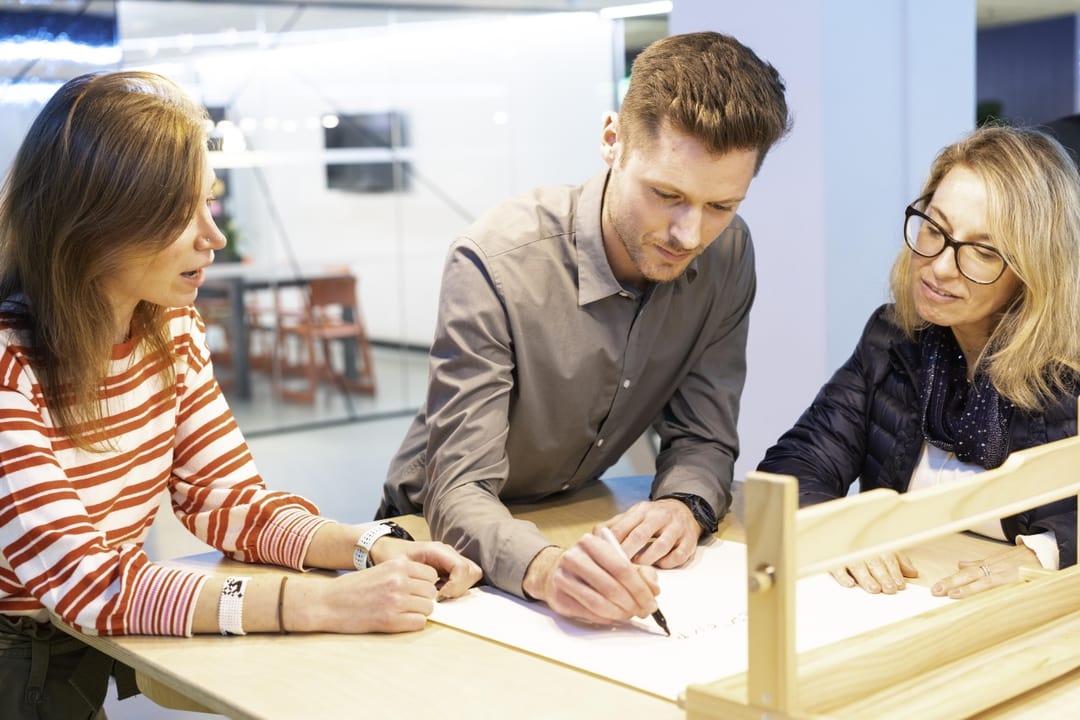 Team collaborating coworking space