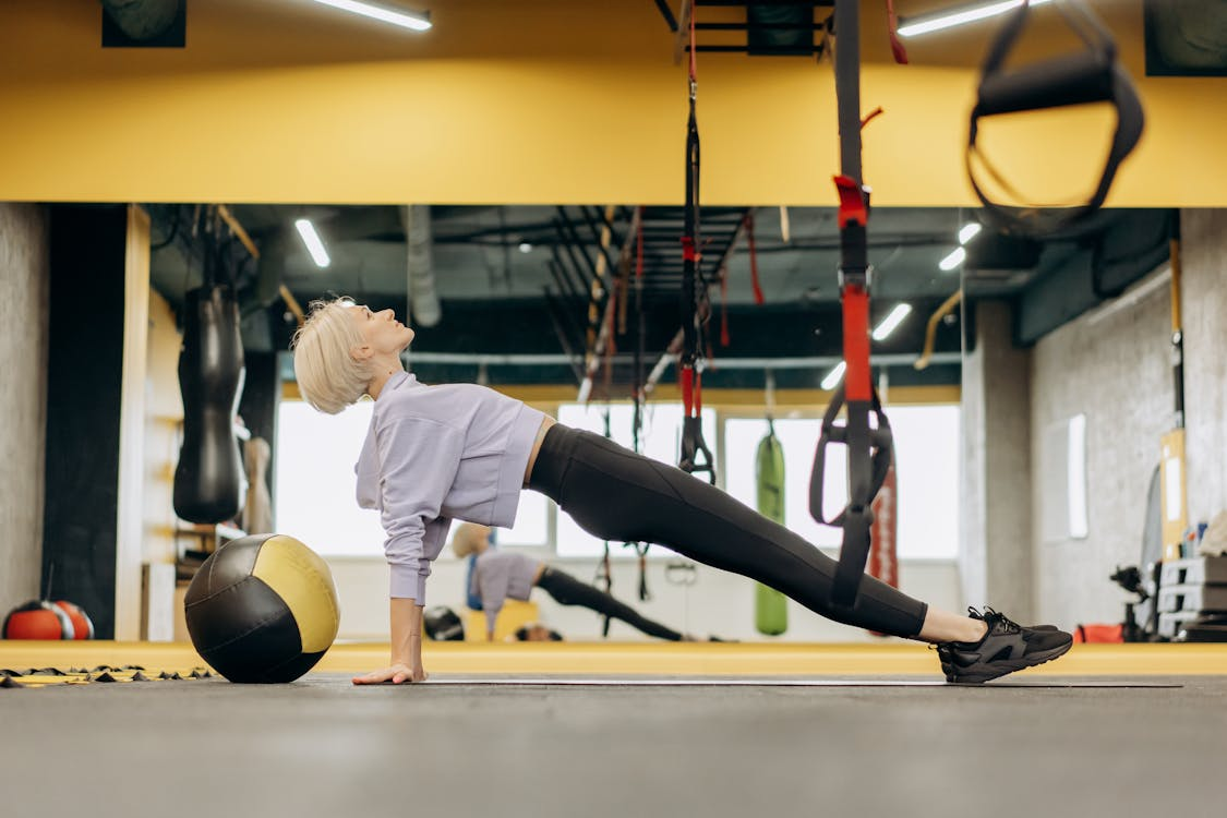 a blonde woman at the gym.