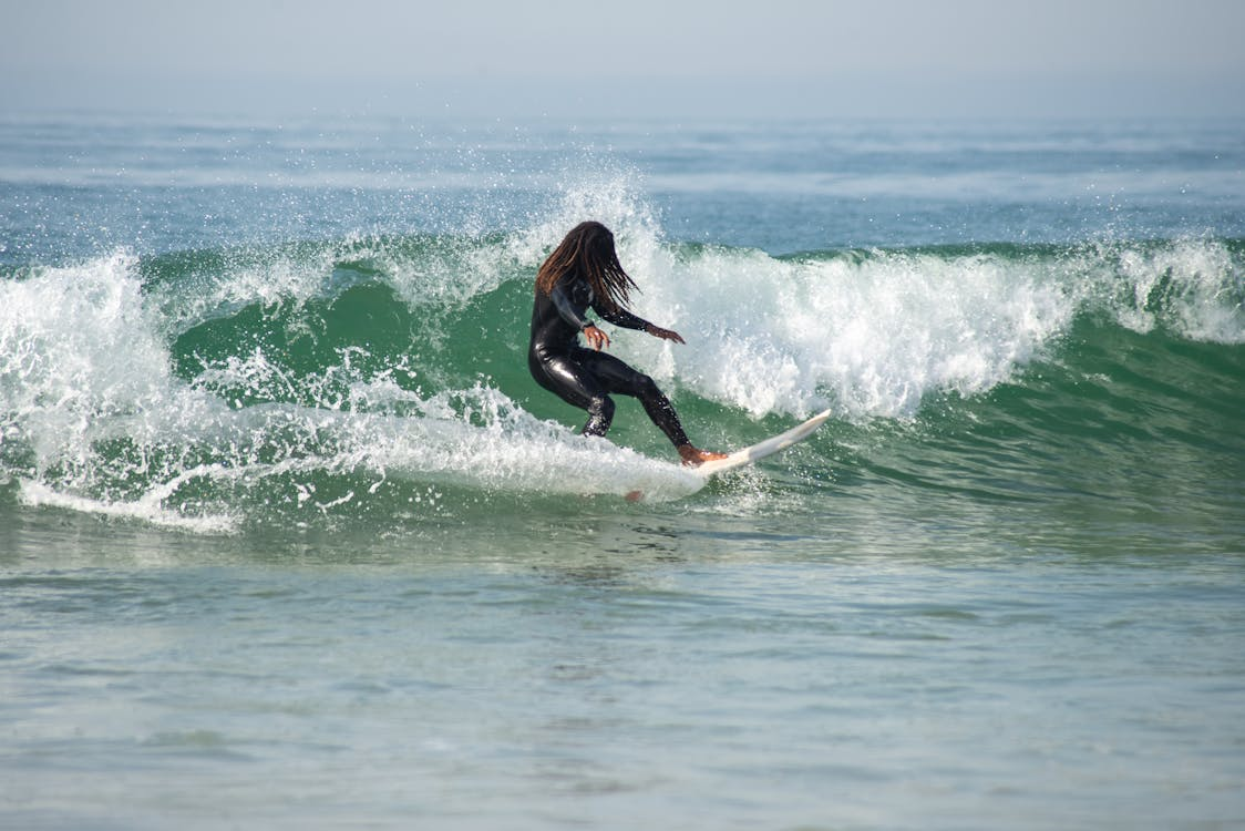A surfer surfing on the sea waves