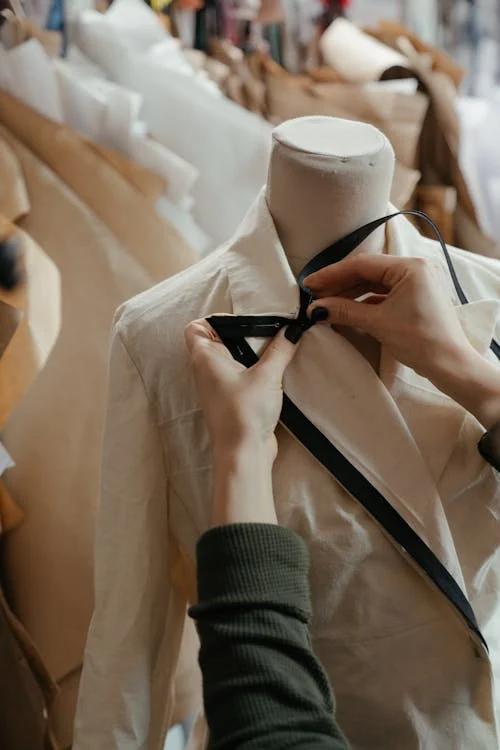 a white suit jacket by Lefty Production Co.