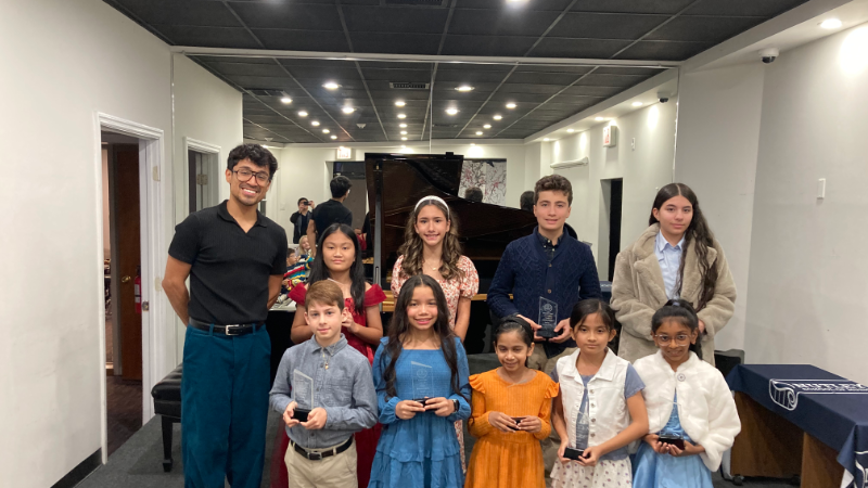 students and staff after the in-house recital.