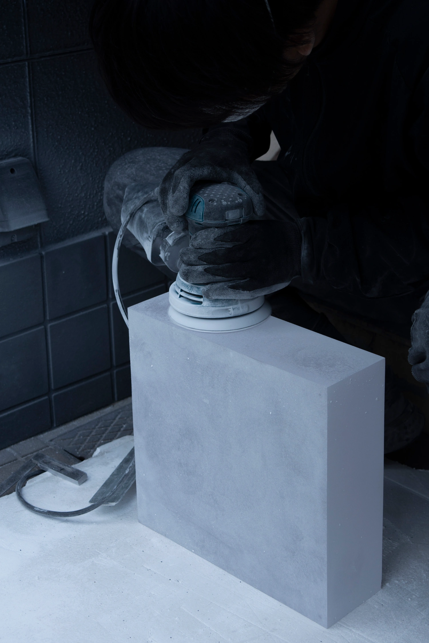 So Koizumi’s As collection reimagines asphalt as a connective force, uniting stone, metal, and resin. Design, minimalism