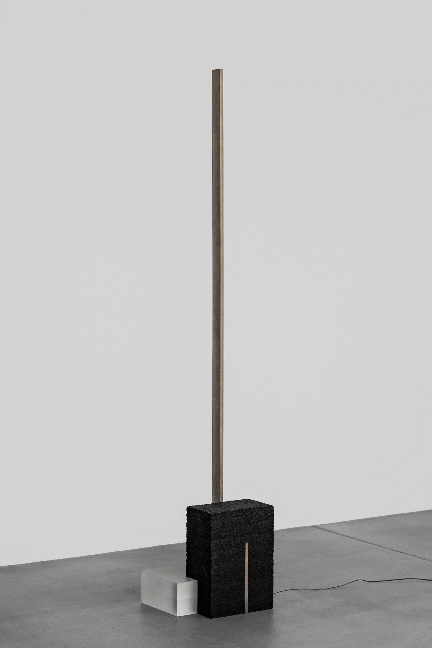 So Koizumi’s As collection reimagines asphalt as a connective force, uniting stone, metal, and resin. Design, minimalism