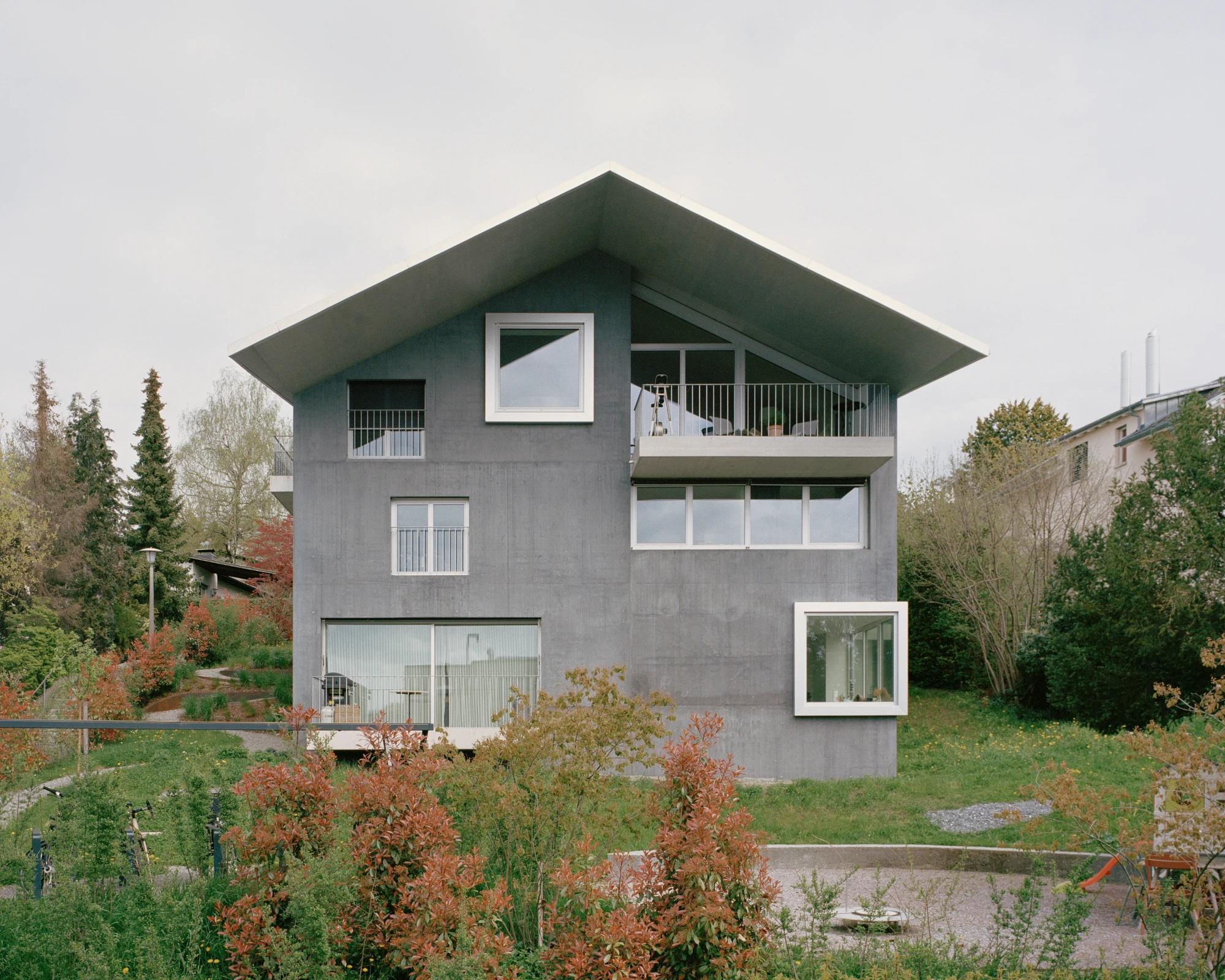 House on a Slope by KARAMUK KUO