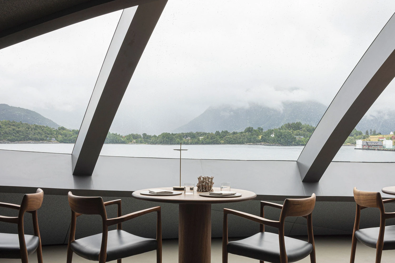 Iris Restaurant interior by Norm Architects inside the Salmon Eye floating structure, Norway Guide, architecture