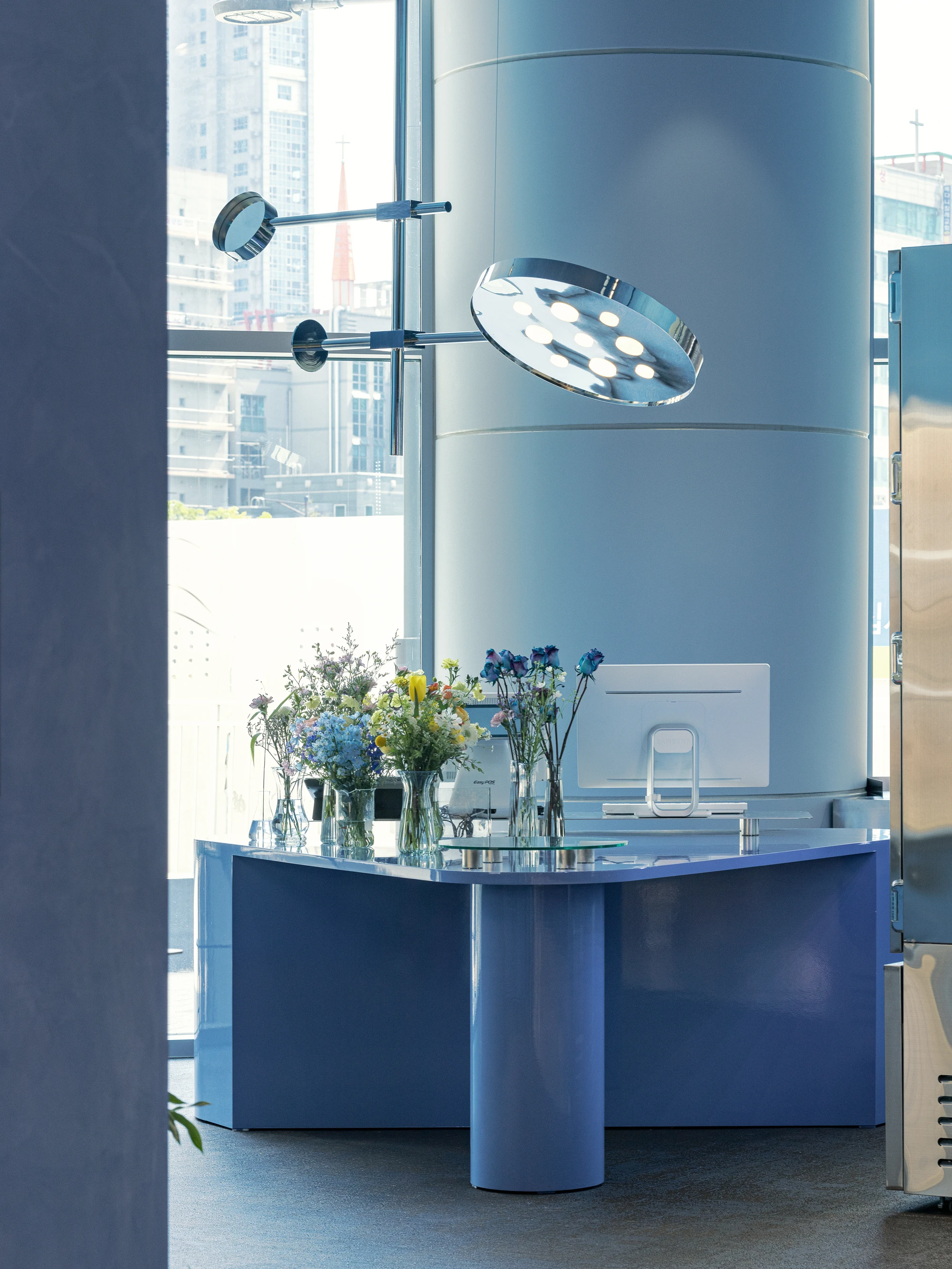 O'flower futuristic florist interior by plainoddity with stainless steel and blue walls, Seoul Guide, interior design