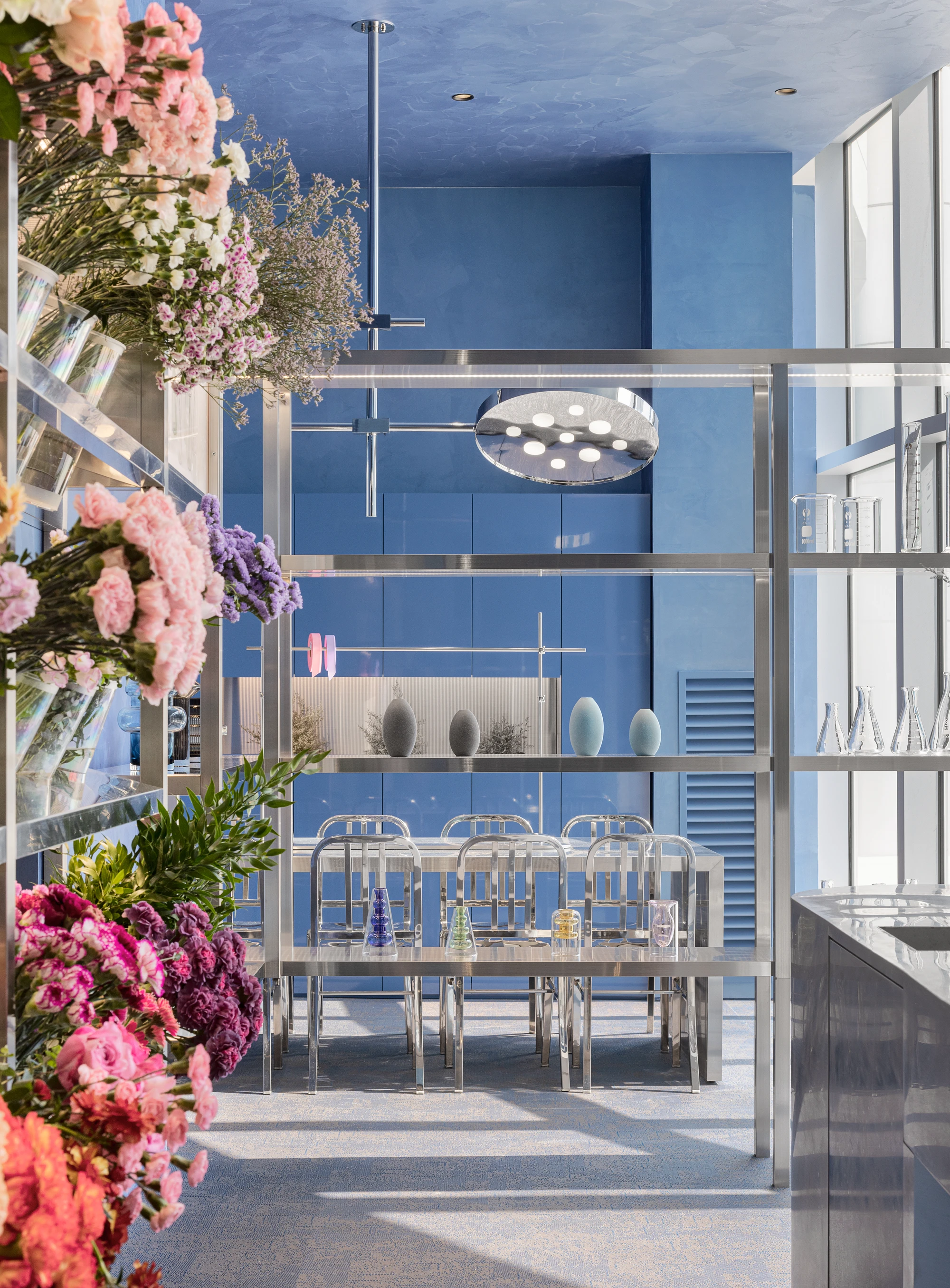 O'flower futuristic florist interior by plainoddity with stainless steel and blue walls, Seoul Guide, interior design