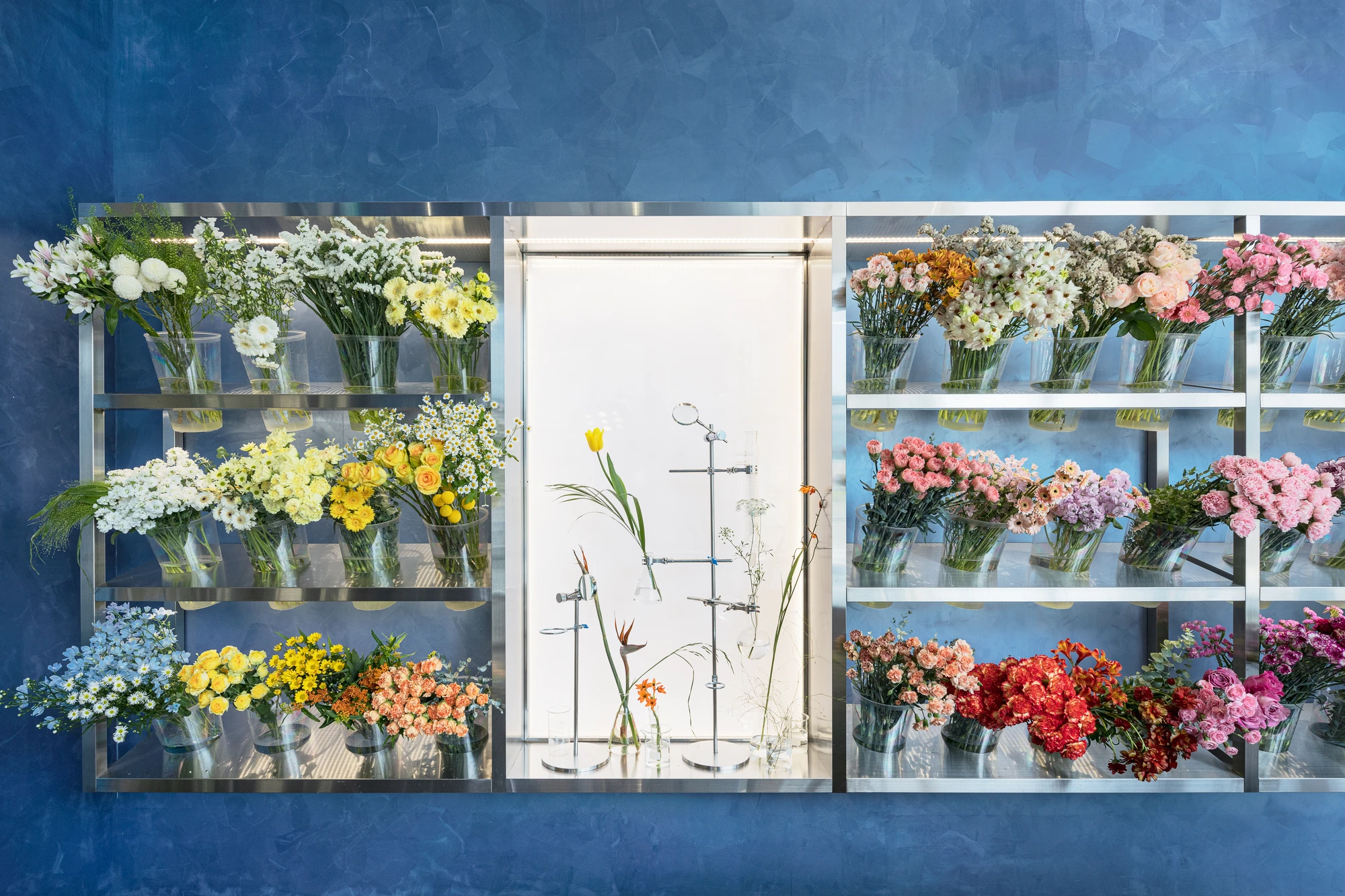 O'flower futuristic florist interior by plainoddity with stainless steel and blue walls, Seoul Guide, interior design