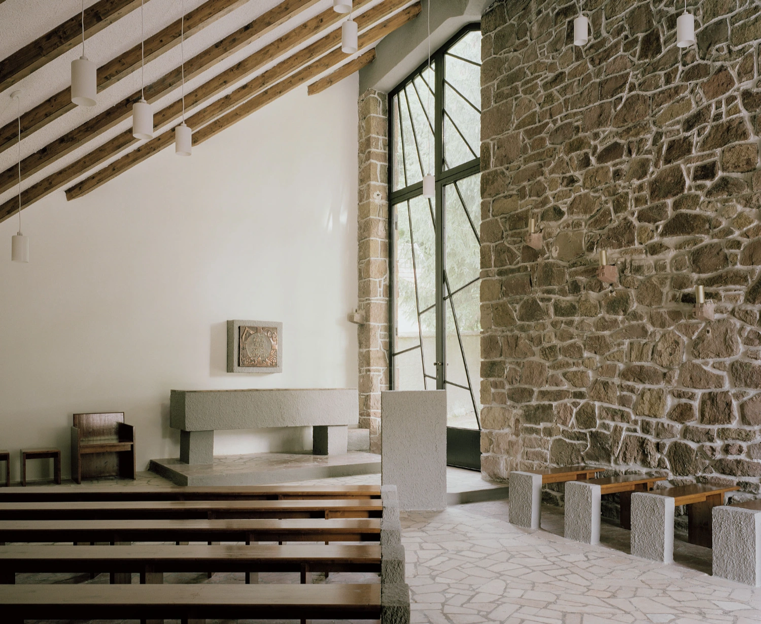 Church of Cserépváralja restoration showing stone walls and new concrete ramp, sacral architecture, Hungary