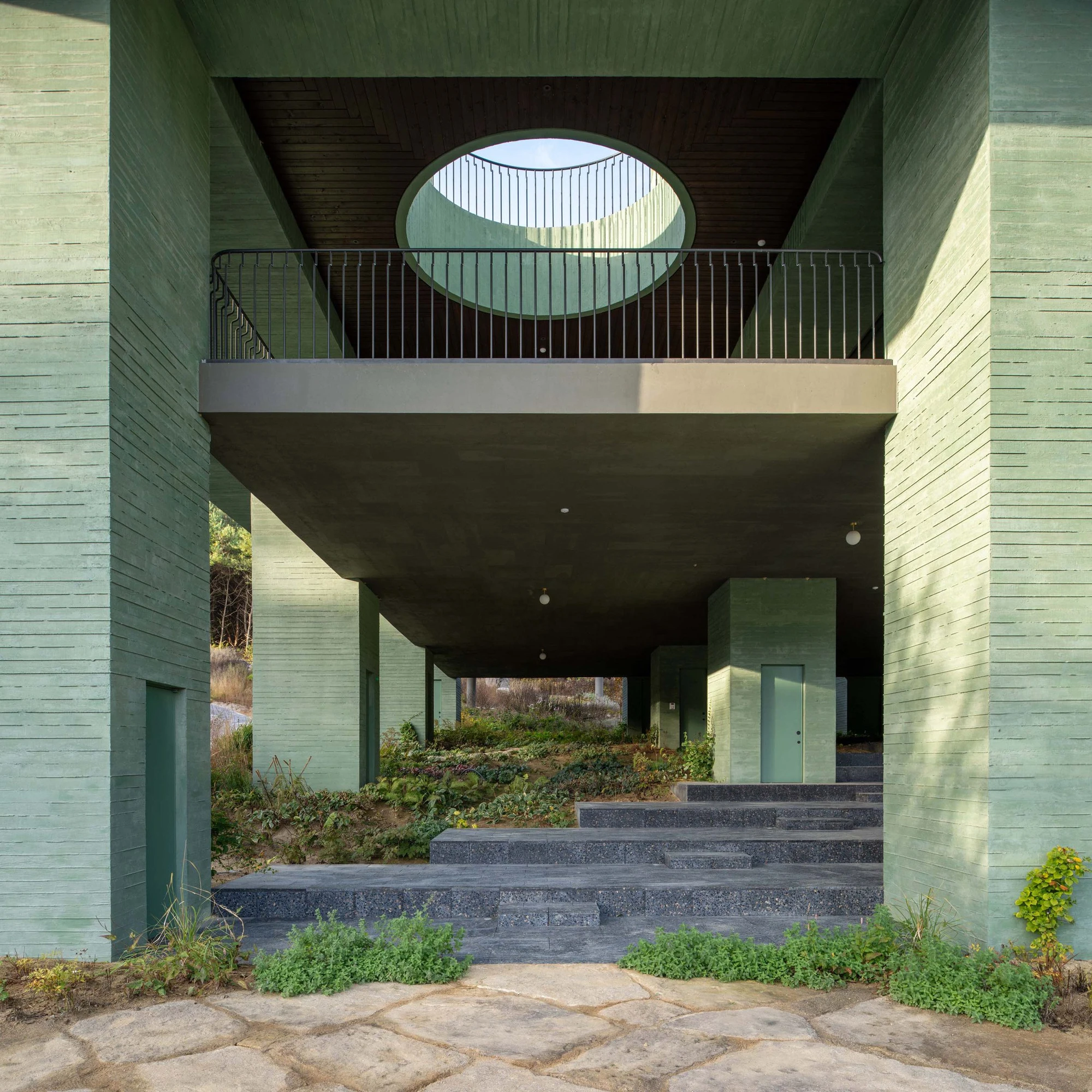 REST restaurant by Pezo von Ellrichshausen with green concrete columns in Korean garden, south korea guide, architecture