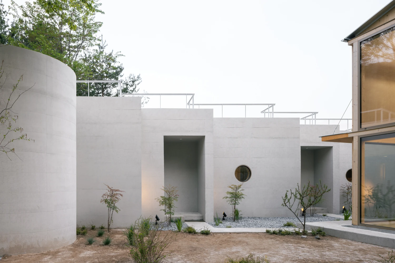 AT.MOS.PHERE work retreat by Agit Studio Architects with concrete and timber volumes, family house, architecture, South Korea