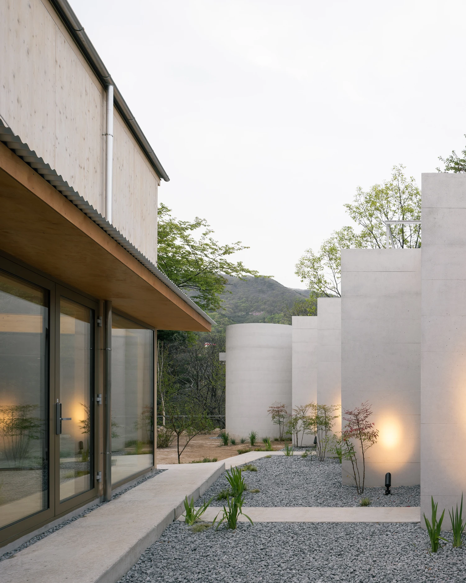 AT.MOS.PHERE work retreat by Agit Studio Architects with concrete and timber volumes, family house, architecture, South Korea