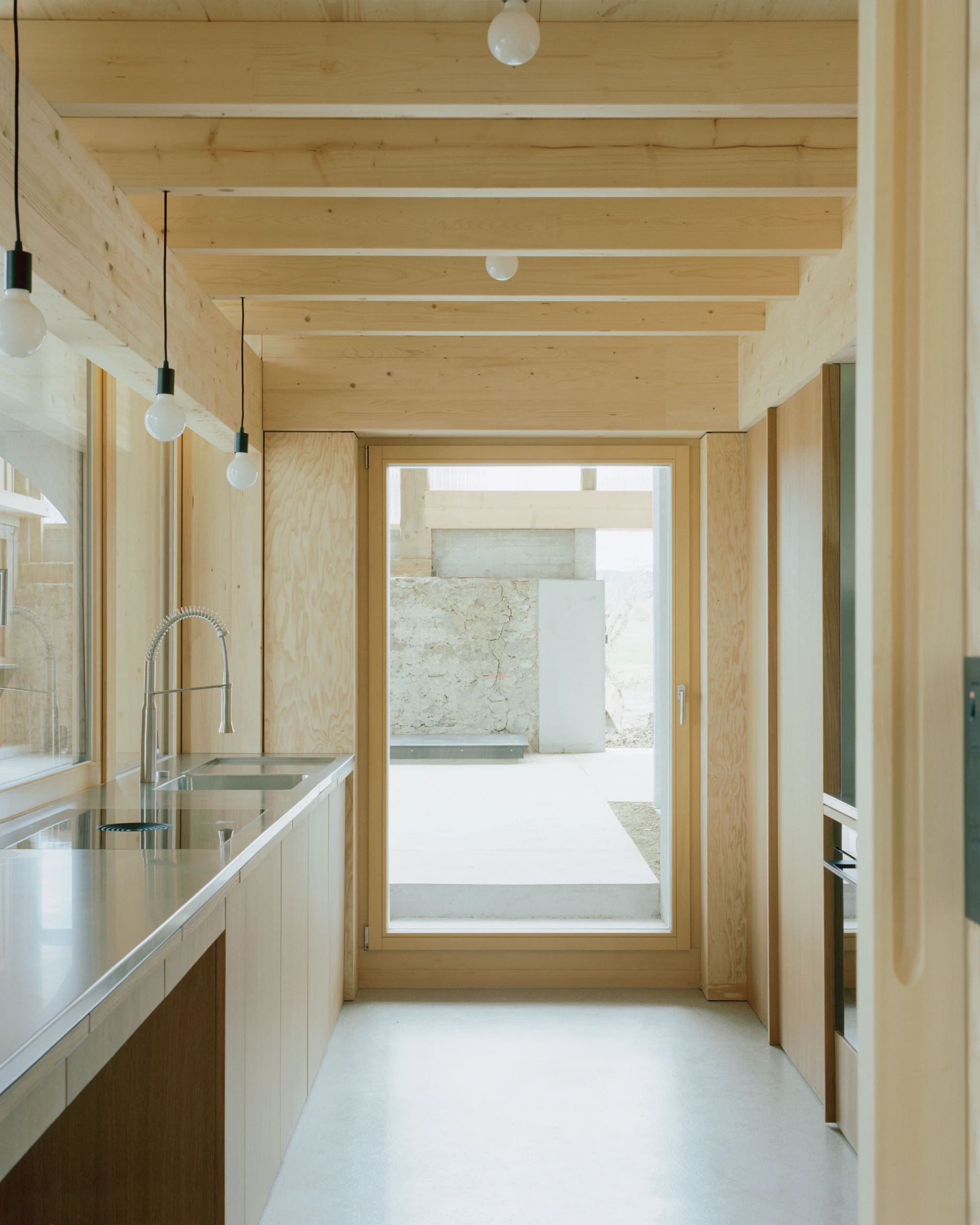 The Inverted Farm renovation by BARD YERSIN Architectes with timber and greenhouse, switzerland, architecture