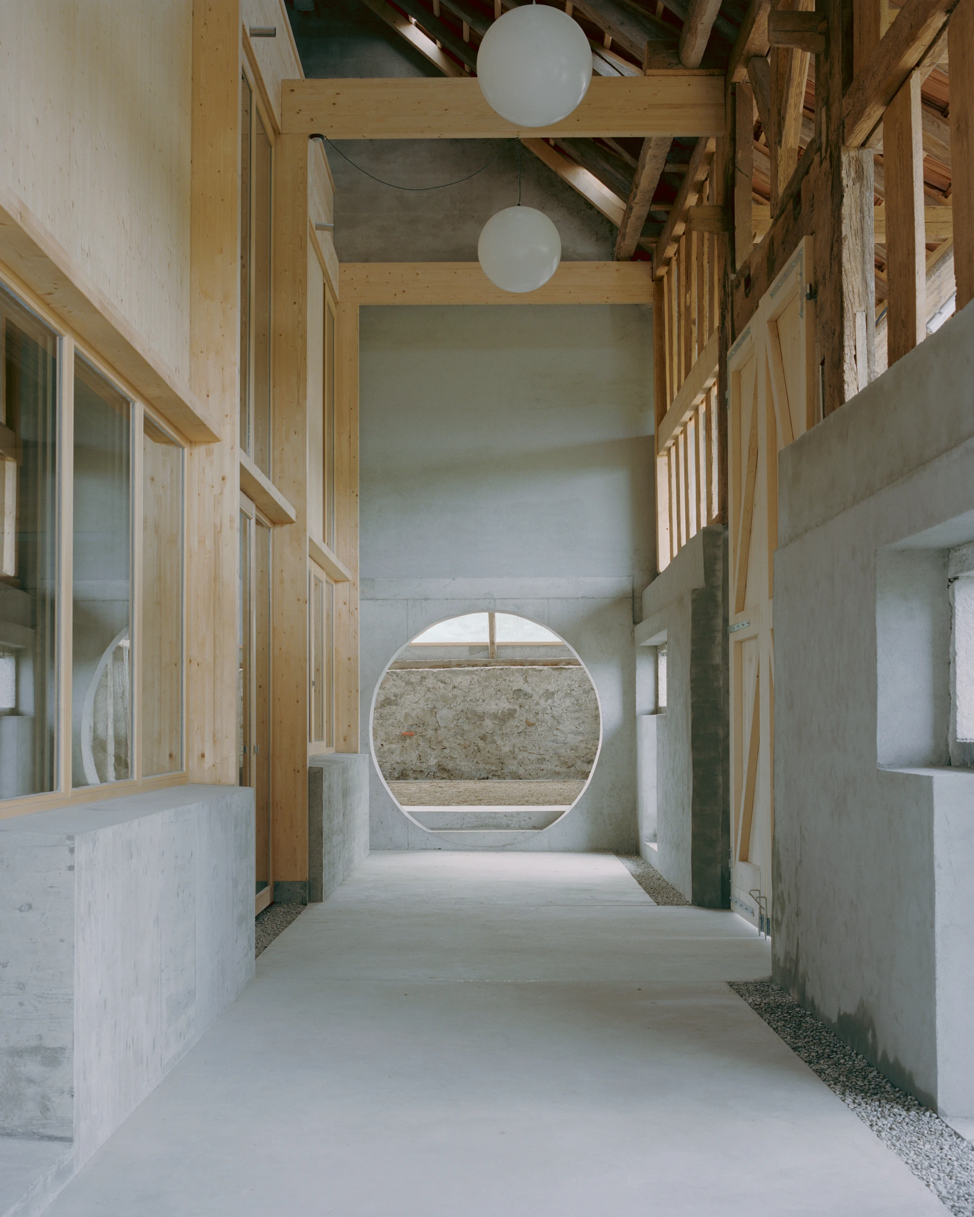 The Inverted Farm renovation by BARD YERSIN Architectes with timber and greenhouse, switzerland, architecture