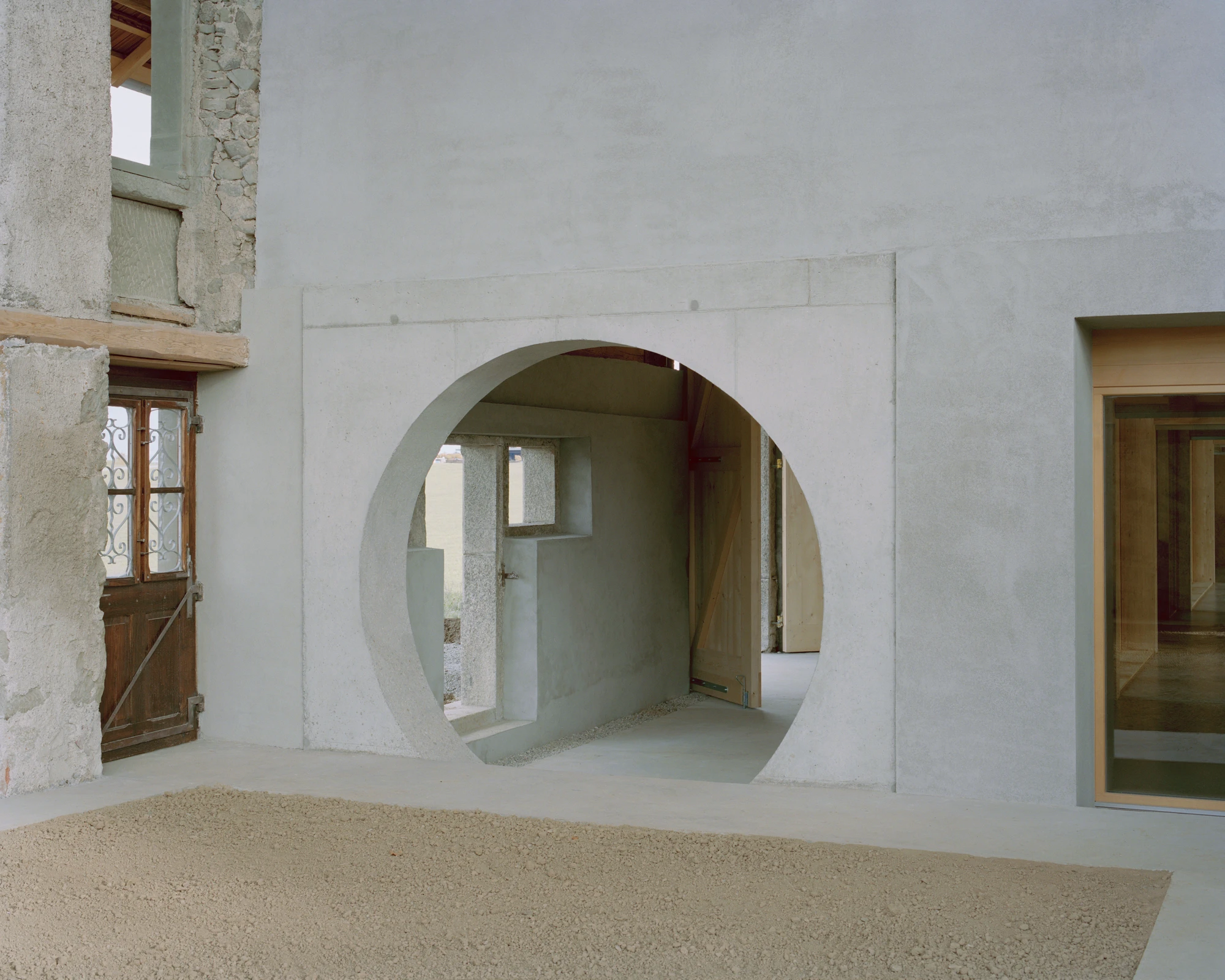 The Inverted Farm renovation by BARD YERSIN Architectes with timber and greenhouse, switzerland, architecture