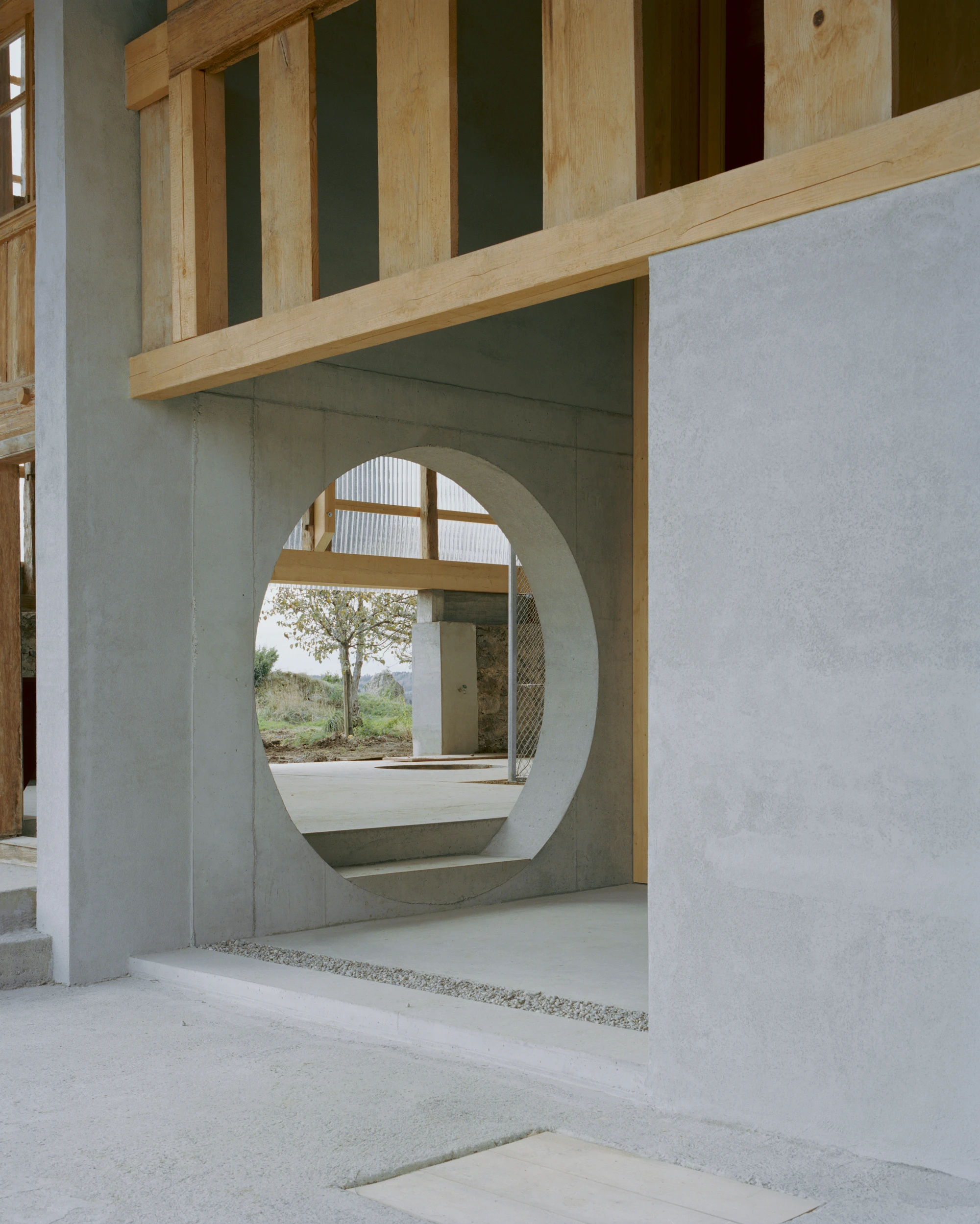 The Inverted Farm renovation by BARD YERSIN Architectes with timber and greenhouse, switzerland, architecture