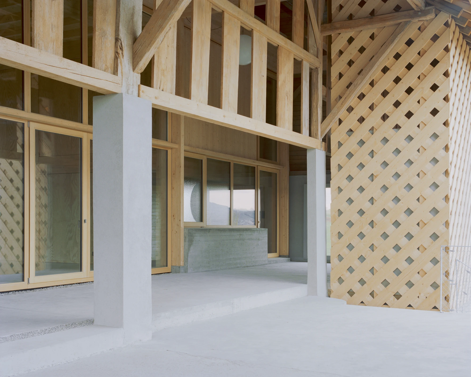 The Inverted Farm renovation by BARD YERSIN Architectes with timber and greenhouse, switzerland, architecture