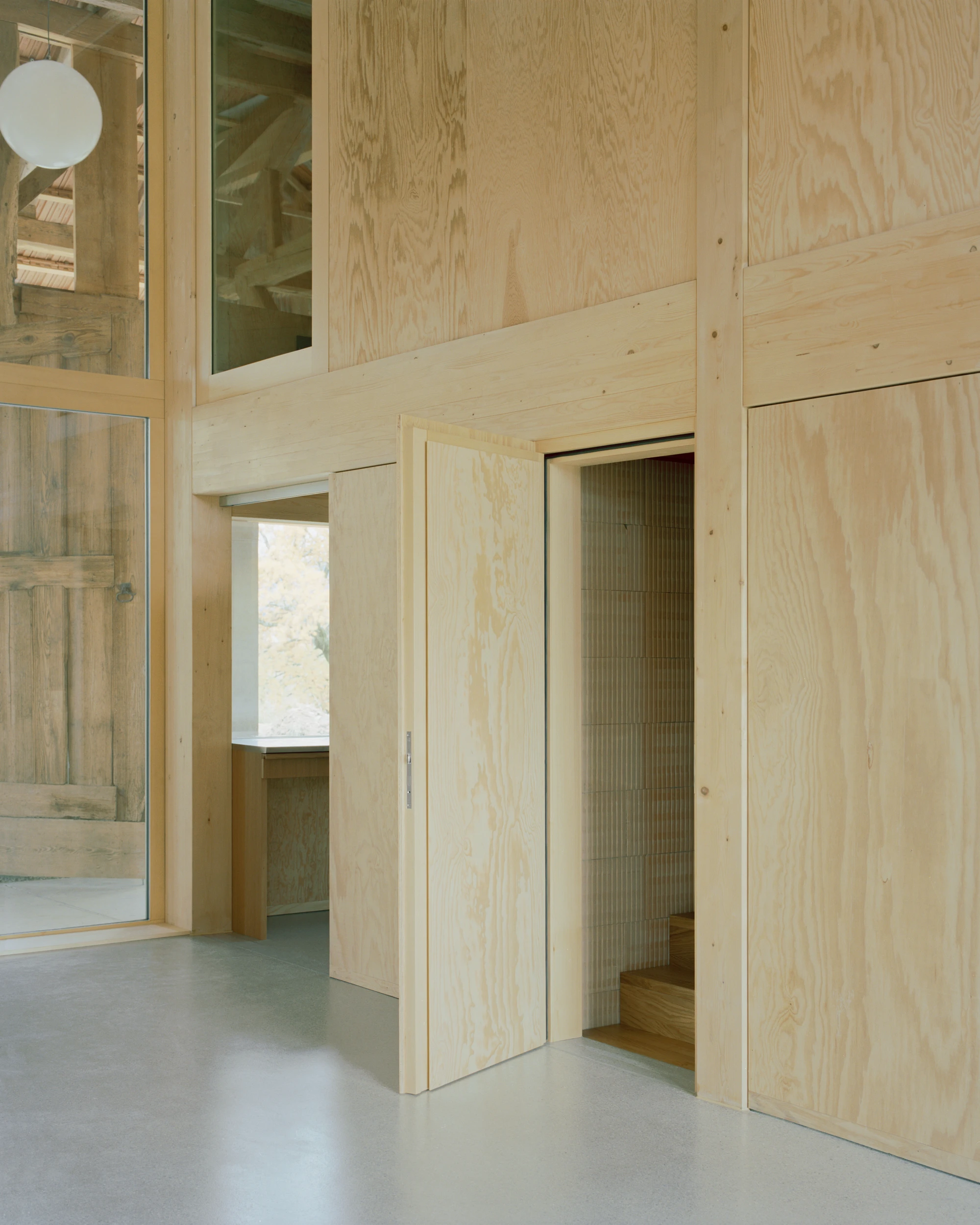 The Inverted Farm renovation by BARD YERSIN Architectes with timber and greenhouse, switzerland, architecture