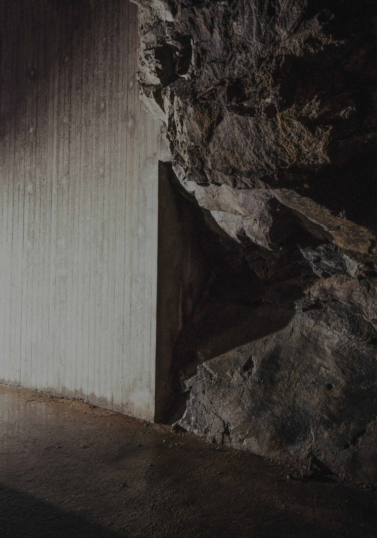 The Mountain Chamber by Erdegard Arkitekter, Gothenburg, Sweden Guide, cave entrance, monolithic architecture, metal facade