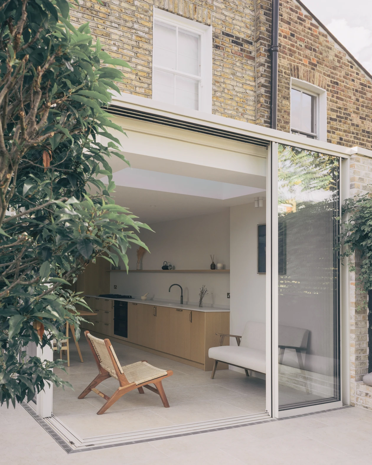 Stoke Newington House by Ambient Studio, London Guide, Victorian terrace renovation, oak joinery, stone, pale brick, garden