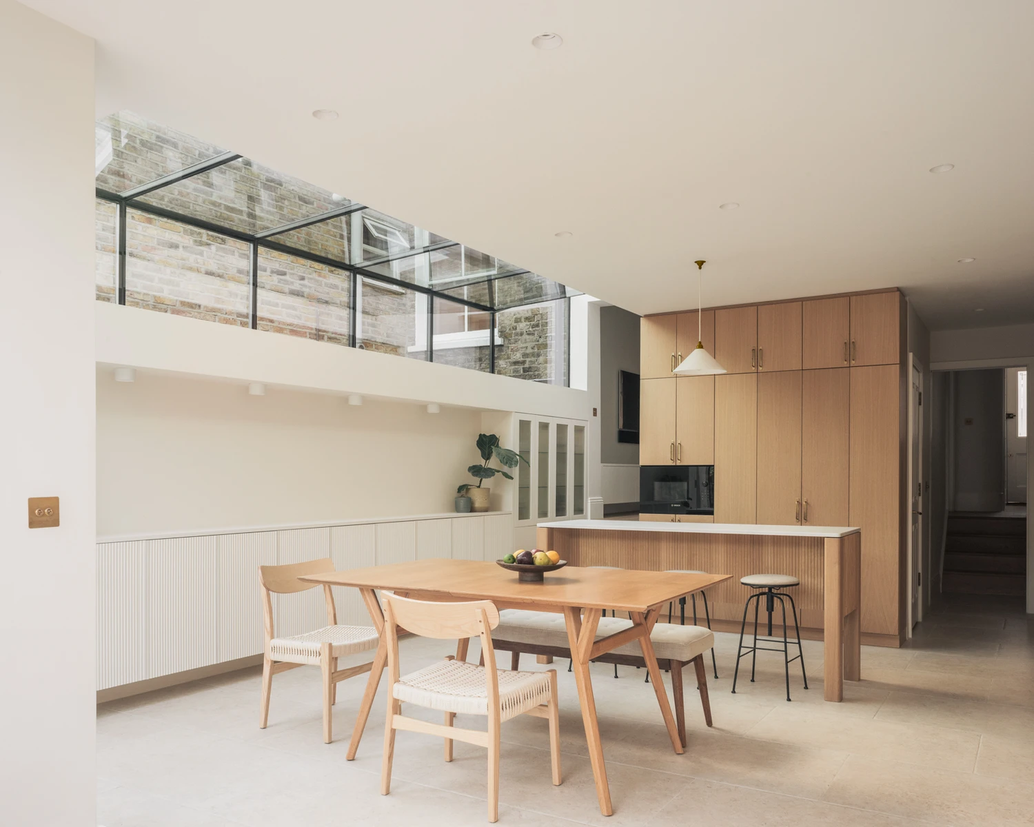 Stoke Newington House by Ambient Studio, London Guide, Victorian terrace renovation, oak joinery, stone, pale brick, garden