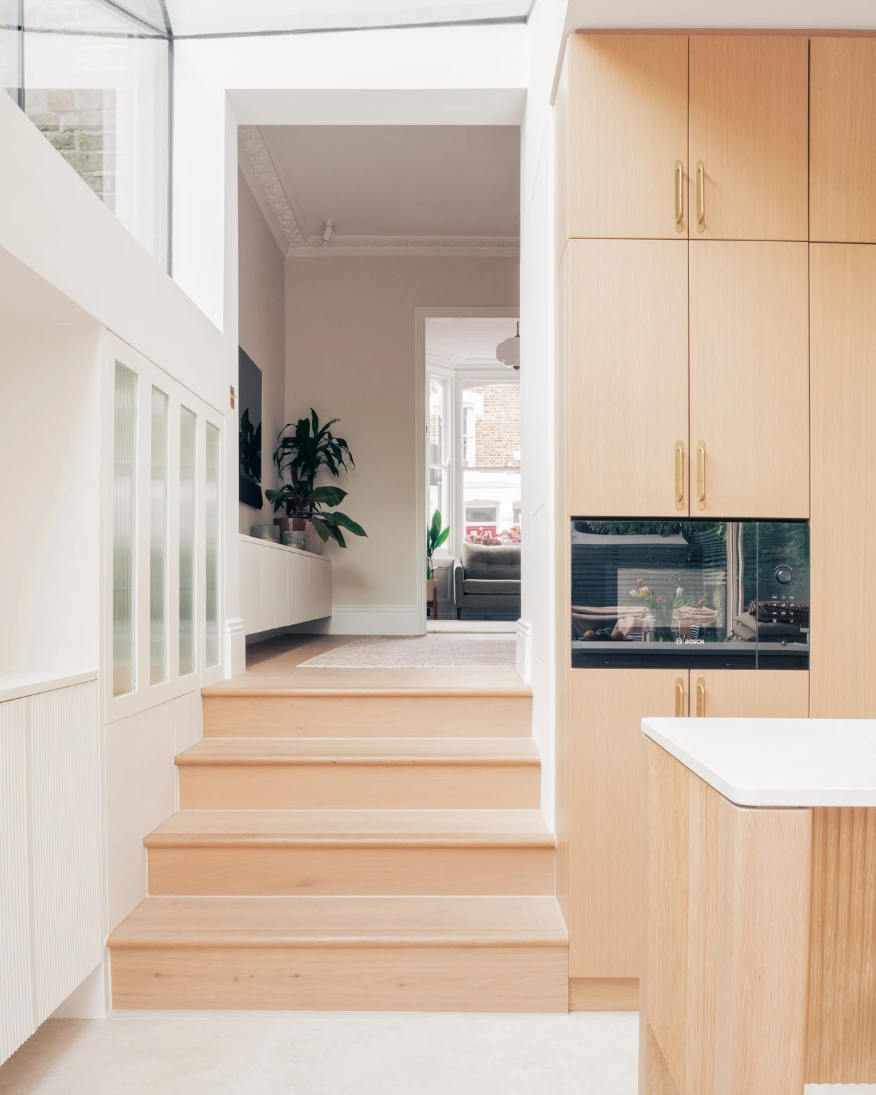 Stoke Newington House by Ambient Studio, London Guide, Victorian terrace renovation, oak joinery, stone, pale brick, garden