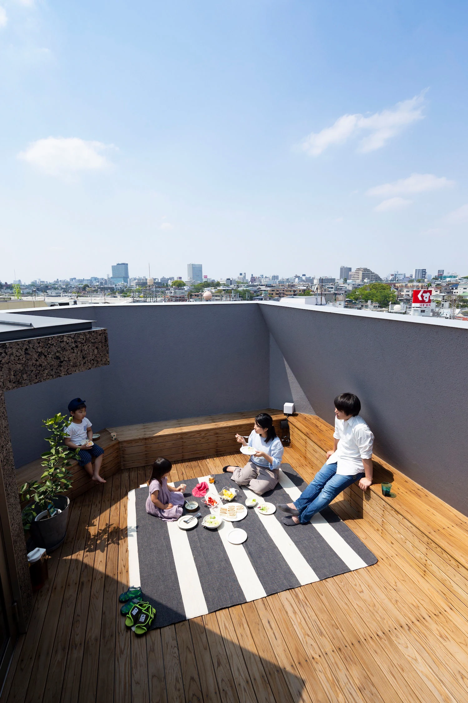 Bay Window Tower House by Takaaki Fuji + Yuko Fuji Architecture in Tokyo Japan, octagonal cork-clad residential tower with bay windows, minimalist Japanese architecture