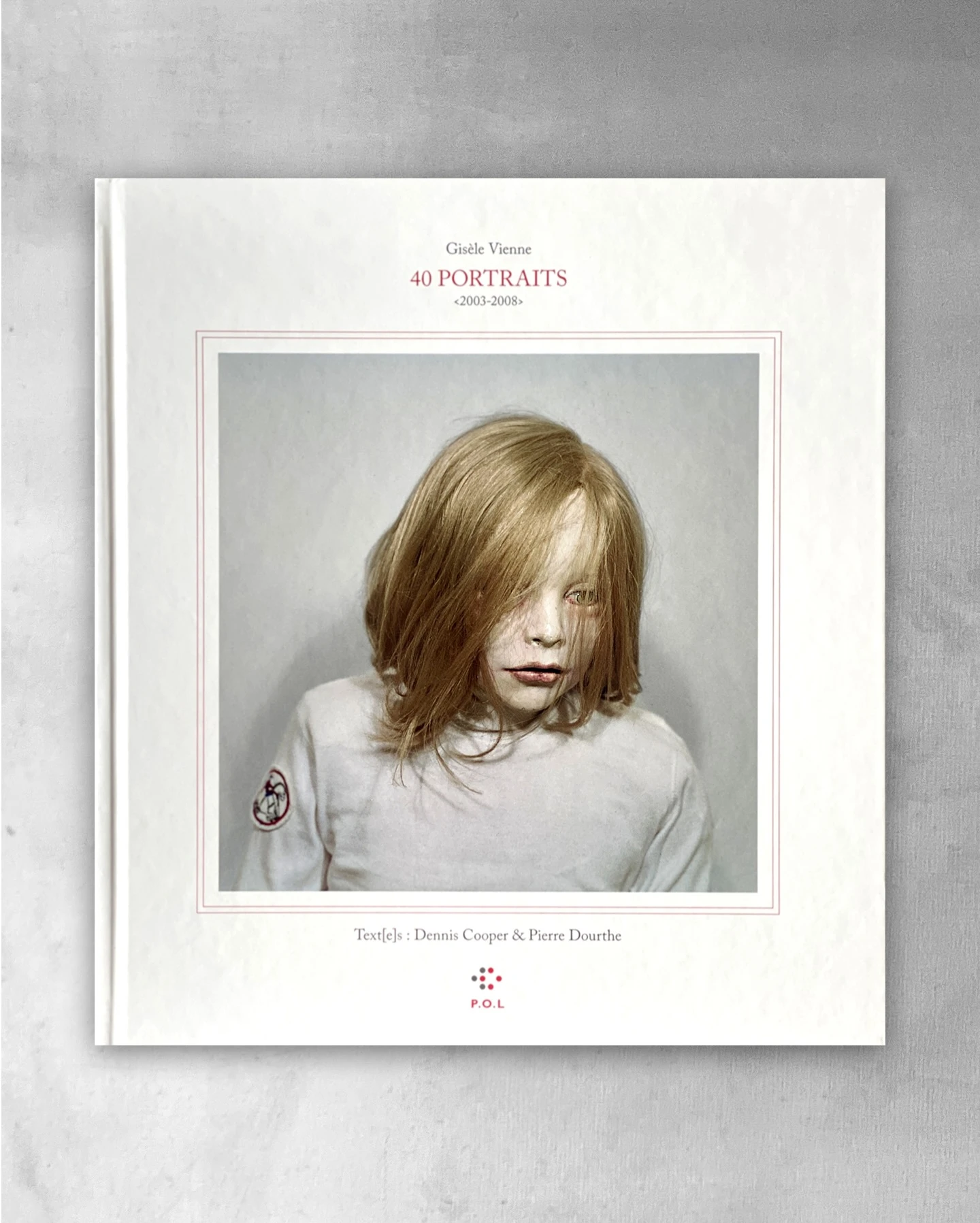 40 Portraits 2003-2008 by Gisèle Vienne, handcrafted doll portrait with pale skin and glazed eyes, contemporary art photography and sculpture